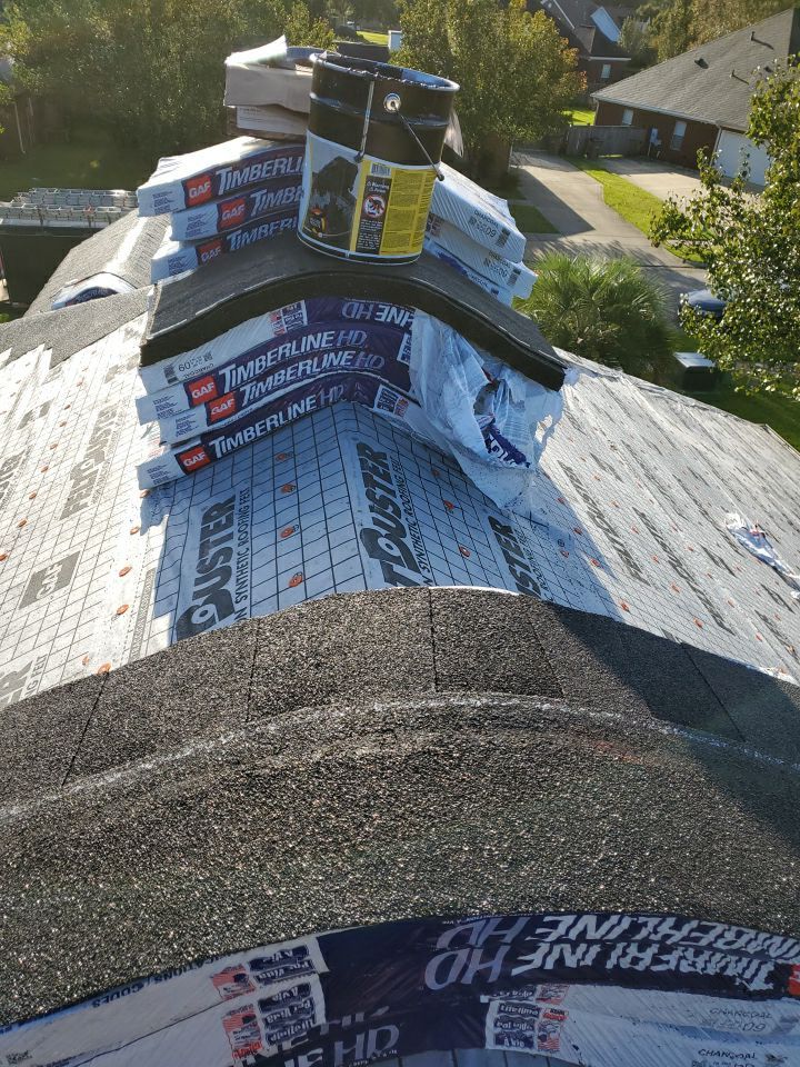 Residential Roofing Installation using Roof Replacement by American Roofing & Construction LLC