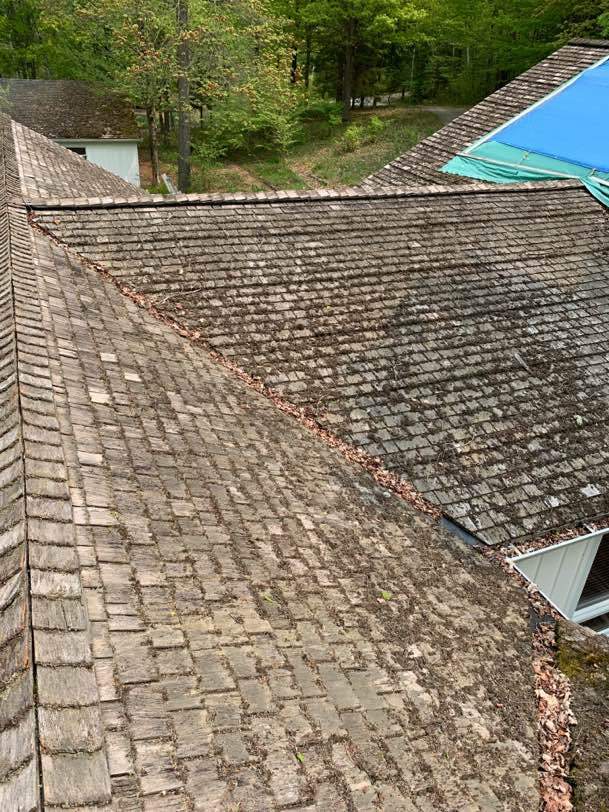 Residential Roofing Installation using 24 Ga Standing Seam Meta by Jay Carter Roofing & Sheet Metal