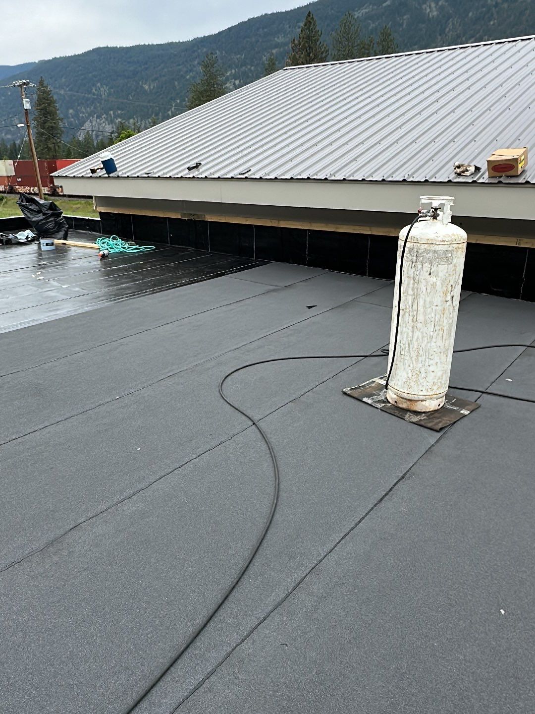 Commercial Roofing Installation using IKO 2ply sbs  by Top Notch Roofing Inc