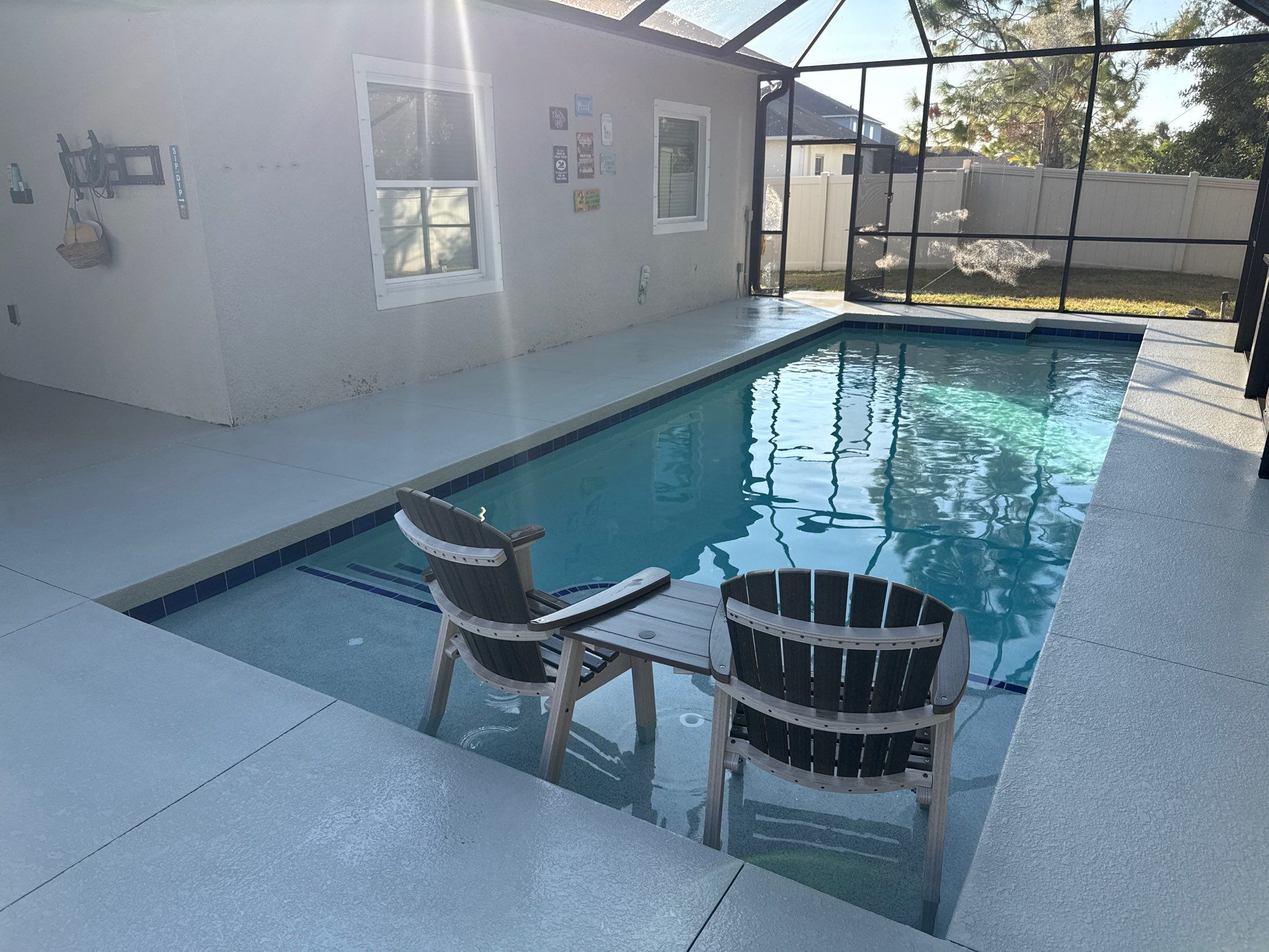 Painted Pool Deck & Screen Enclosure Cleaning | Heron Creek, Palmetto FL by Sunshine AquaWash