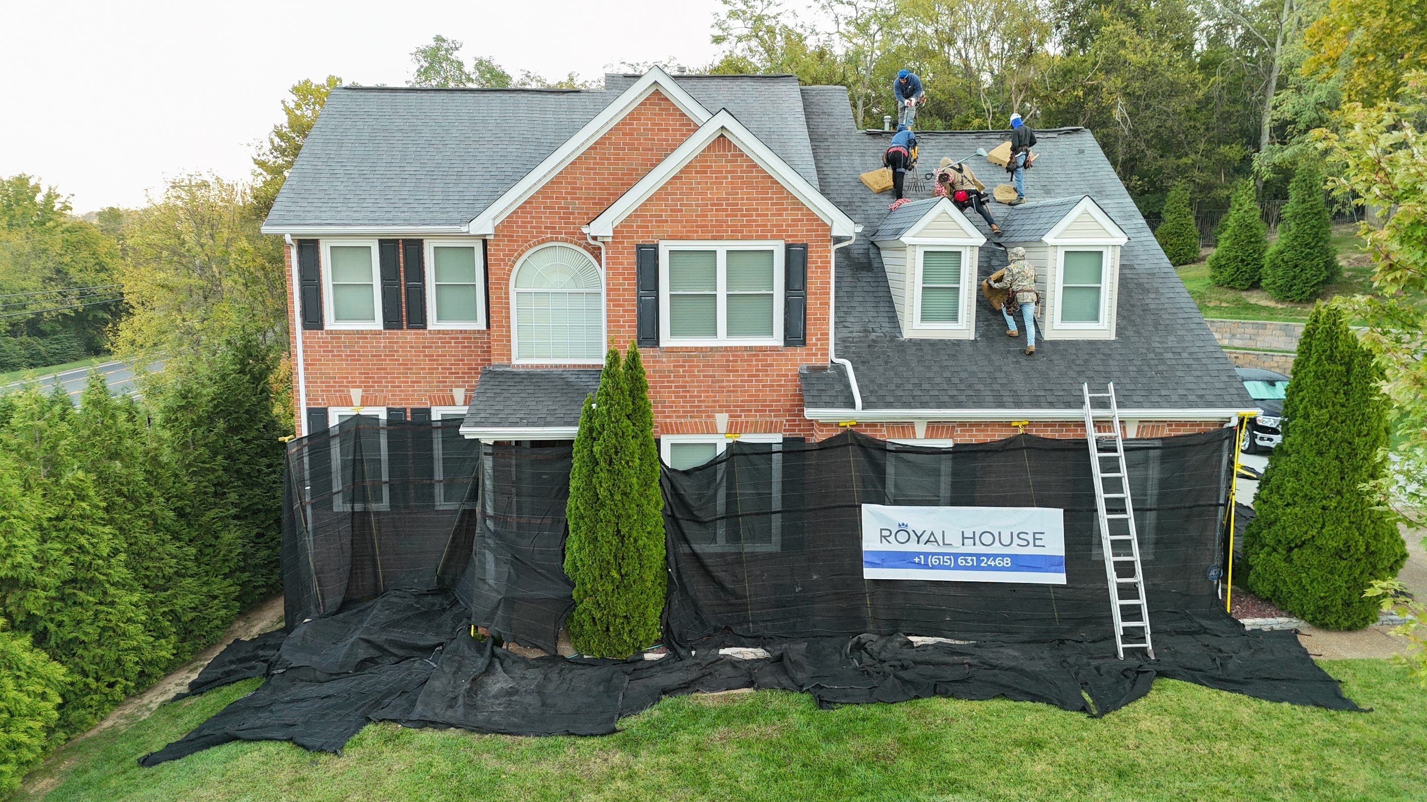 Charcoal Black Re-Roof & Gutters by Royal House LLC