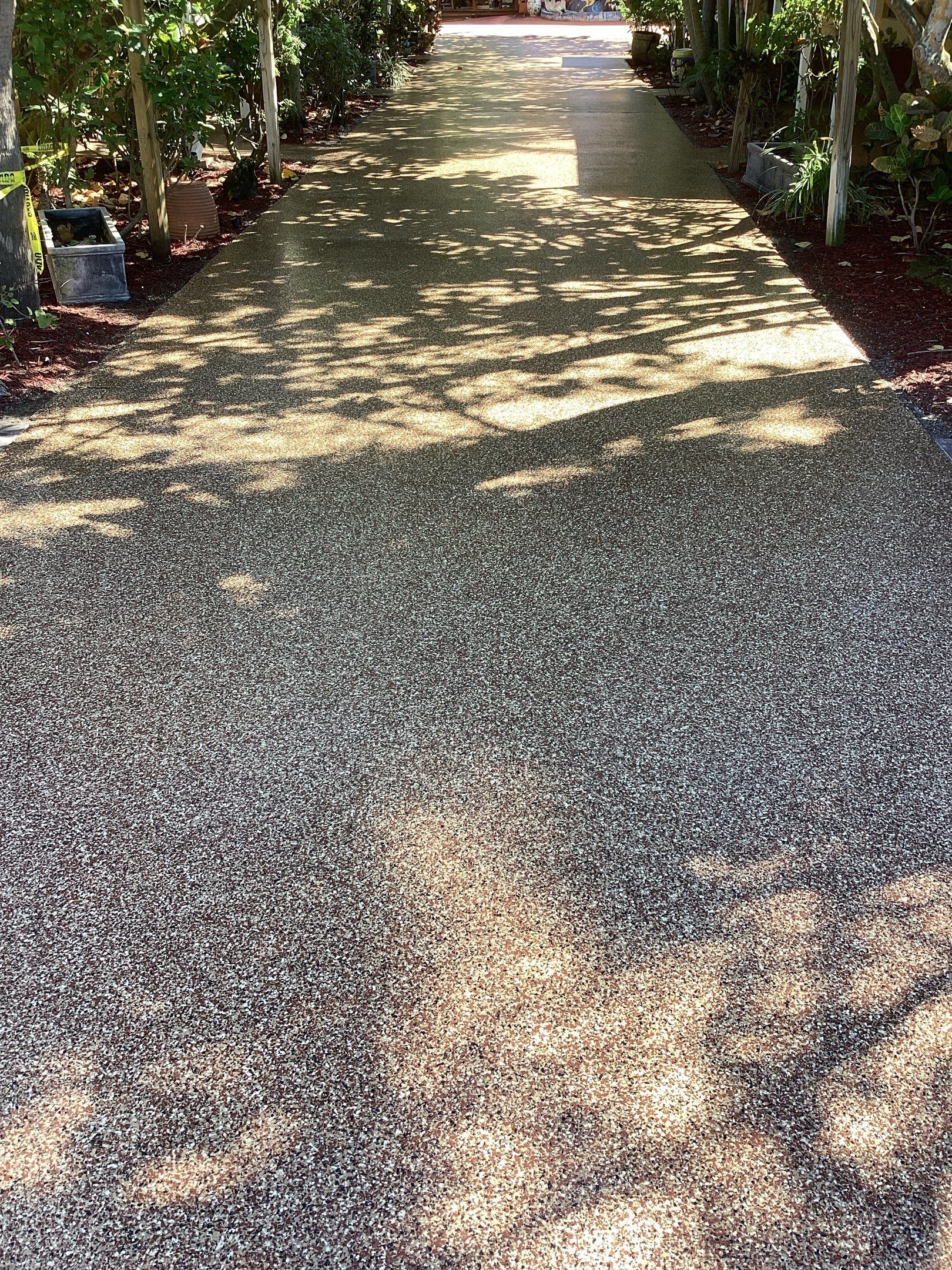 Sidewalks and Porches using Chestnut by Amvet concrete coatings llc