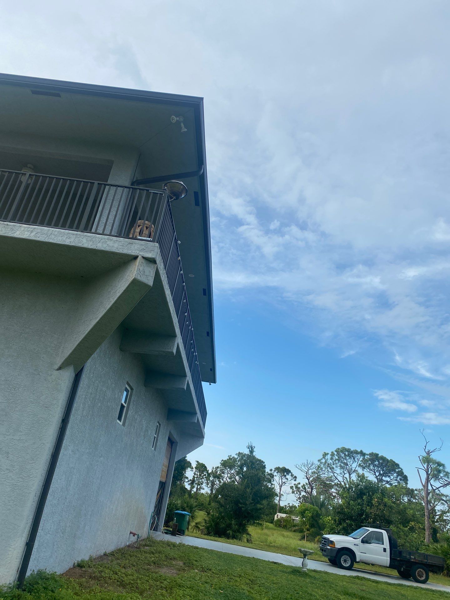 Black Seamless Gutters St. James City by Gutter Professors