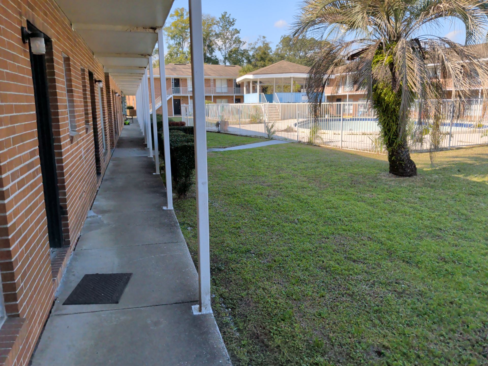 Apartment Landscape Cleanup & Ongoing Grounds Maintenance — Cimarron Apartments (Arlington) by Harmoni Home Services
