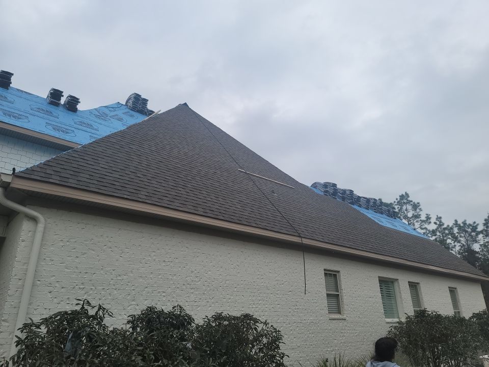 Residential Roofing Installation using Roof Replacement by American Roofing & Construction LLC