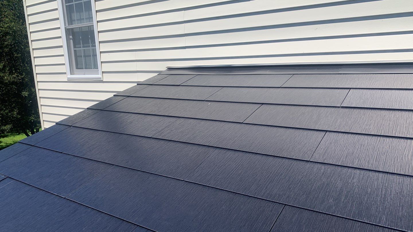 Tesla Solar Roof Replacement using Tesla Solar Roof V3 tiles by American Home Contractors