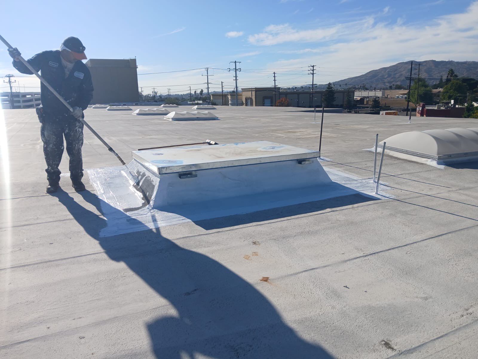 Commercial Roofing Installation using ASC Silicone Membrane by Hull Brothers Roofing