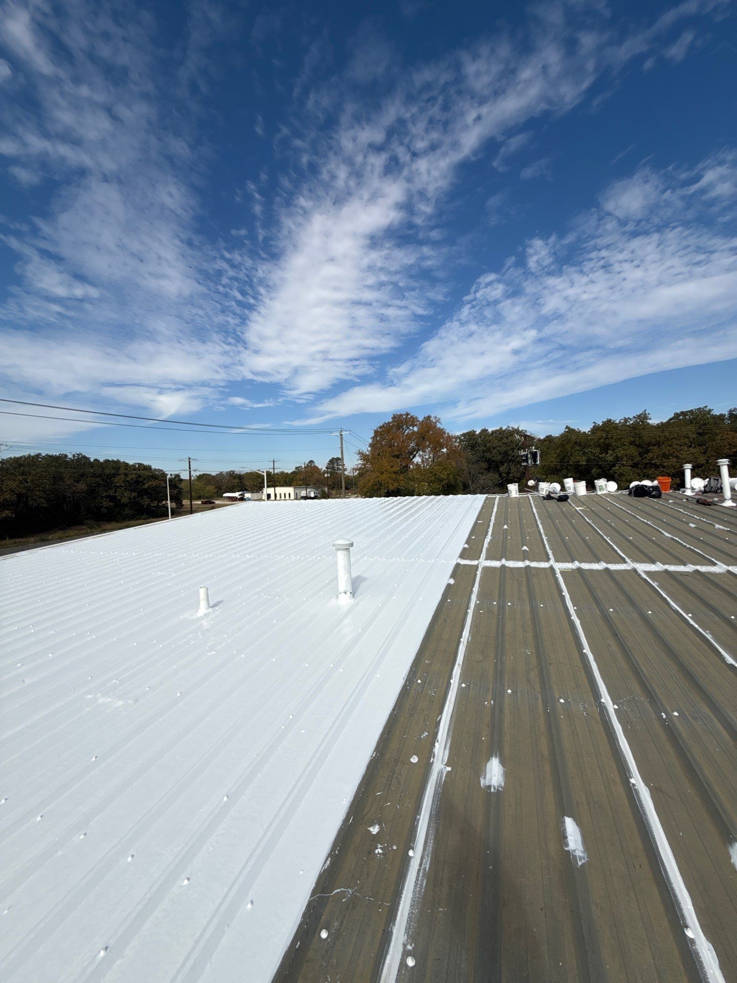 Silicone Coating Metal Rehab by First Out Roofing 