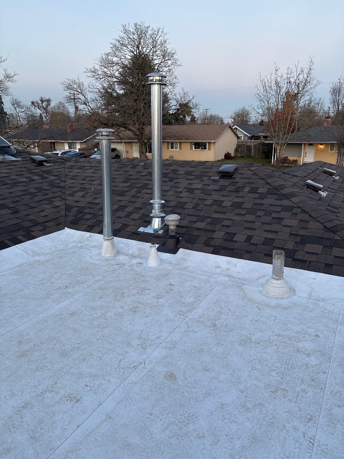 Residential Roofing Installation using IKO Dynasty (Color: Driftshake) by Orezona Building & Roofing Company, Inc.