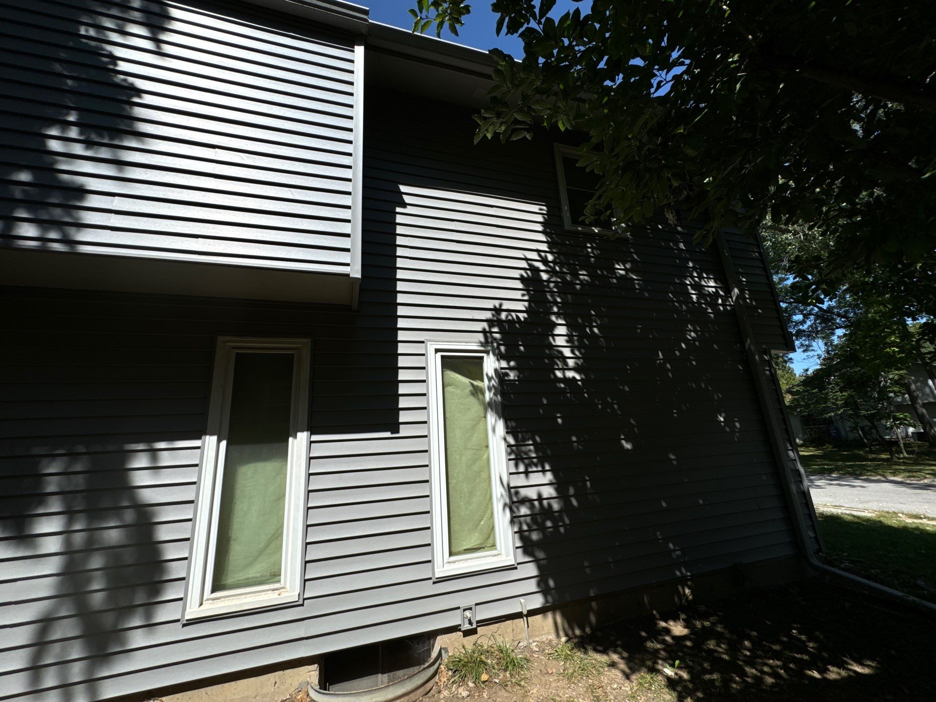BYE BYE Wood Shakes by EEC Windows, Siding & Roofing