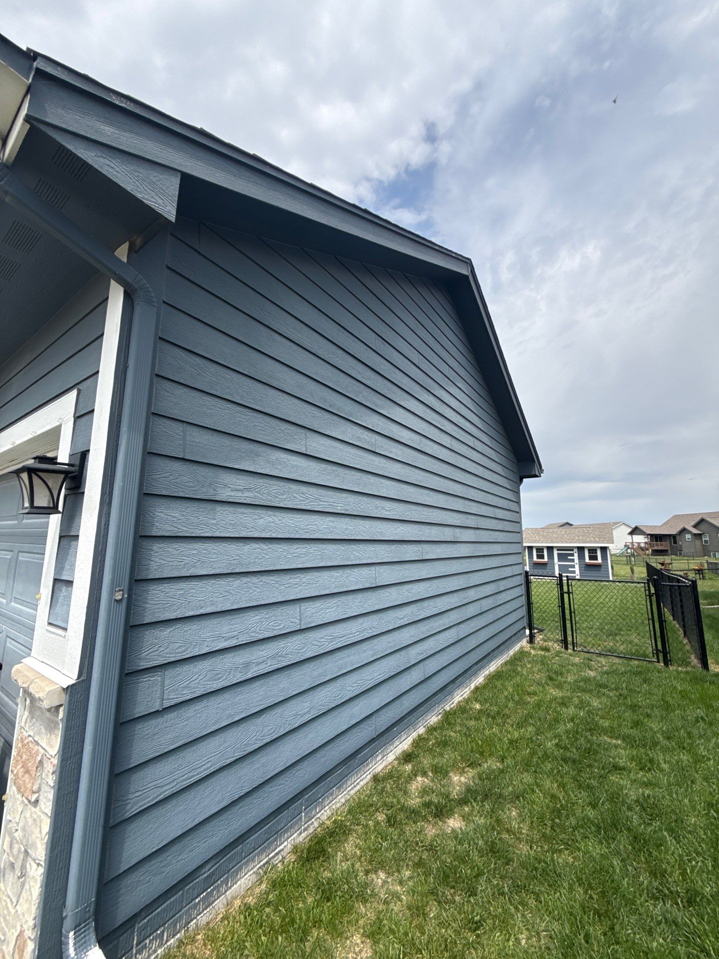 Residential Exterior Repaint in Ankeny by Midwest Paint LLC