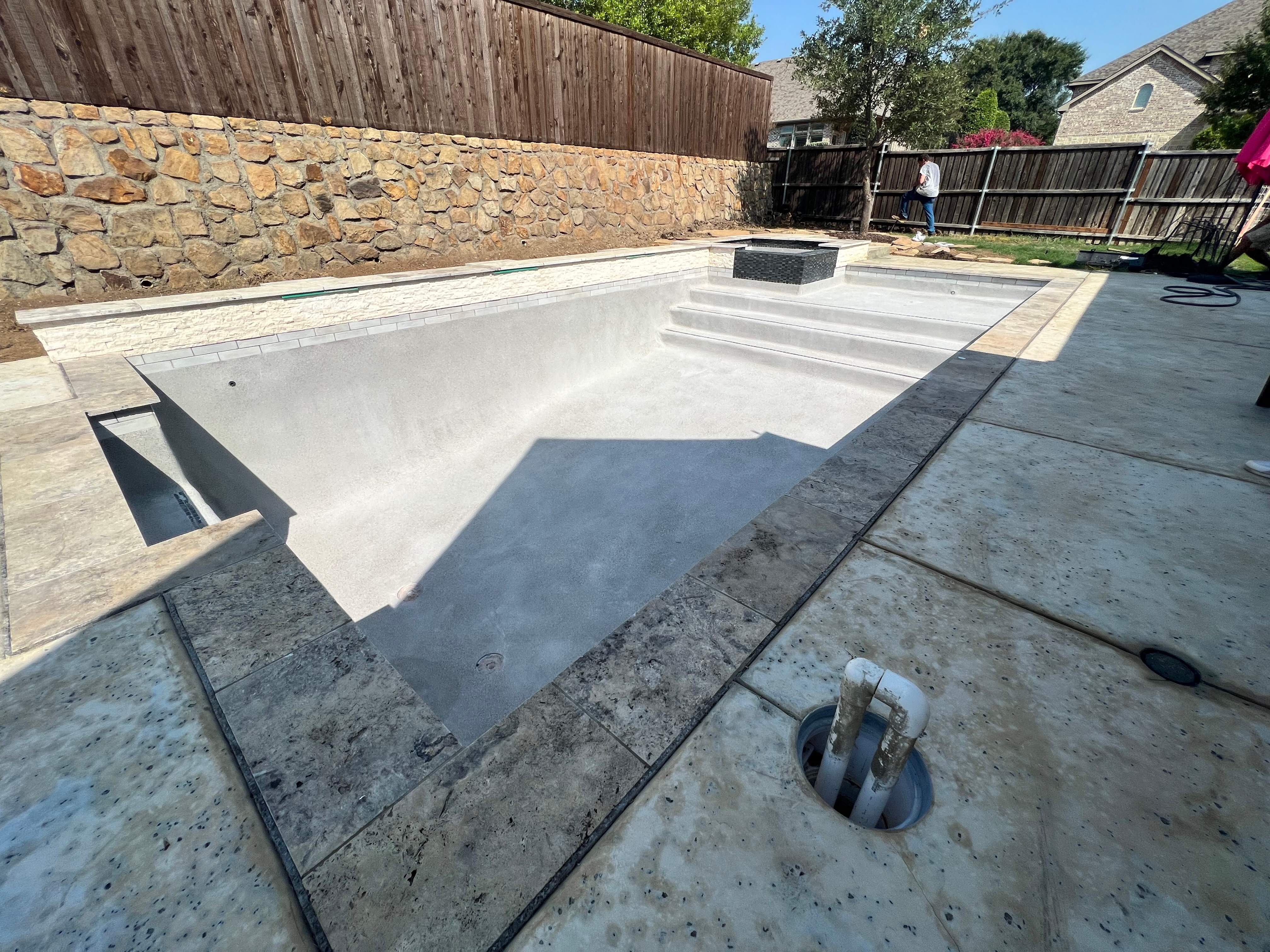 Geometric Pool with Raised Spa and Stone Decking by Pinnacle Pools and Spas - DFW
