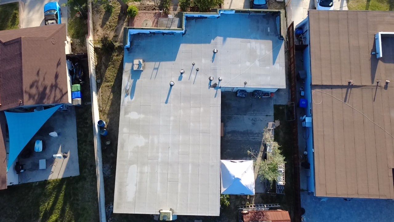 Oceanside Mansard TPO & Shingle Roof Replacement by Zenith Roofing Services