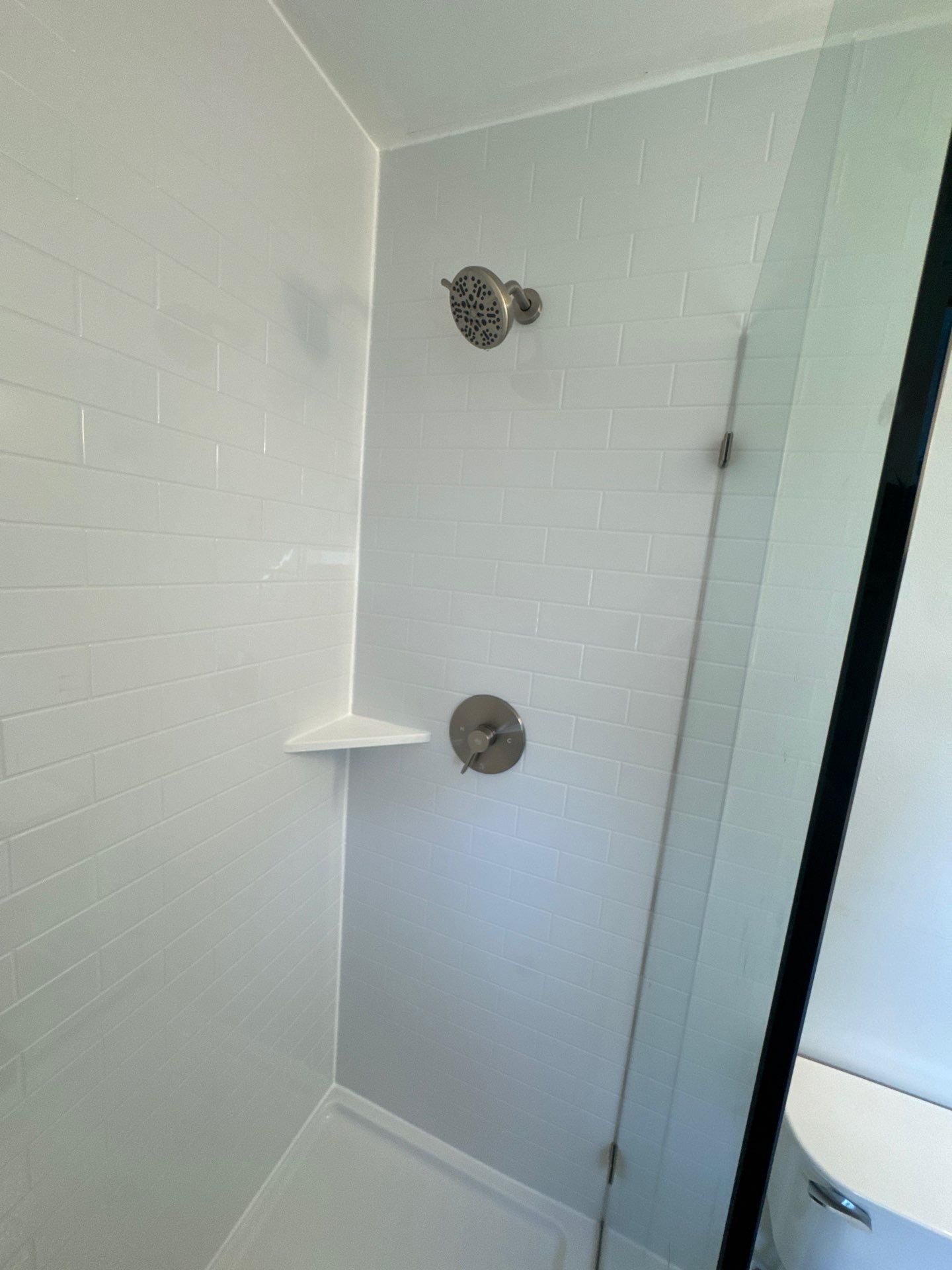 Modern Bathroom Remodel Featuring Subway Tile Surround in Deale by Window Depot of Annapolis