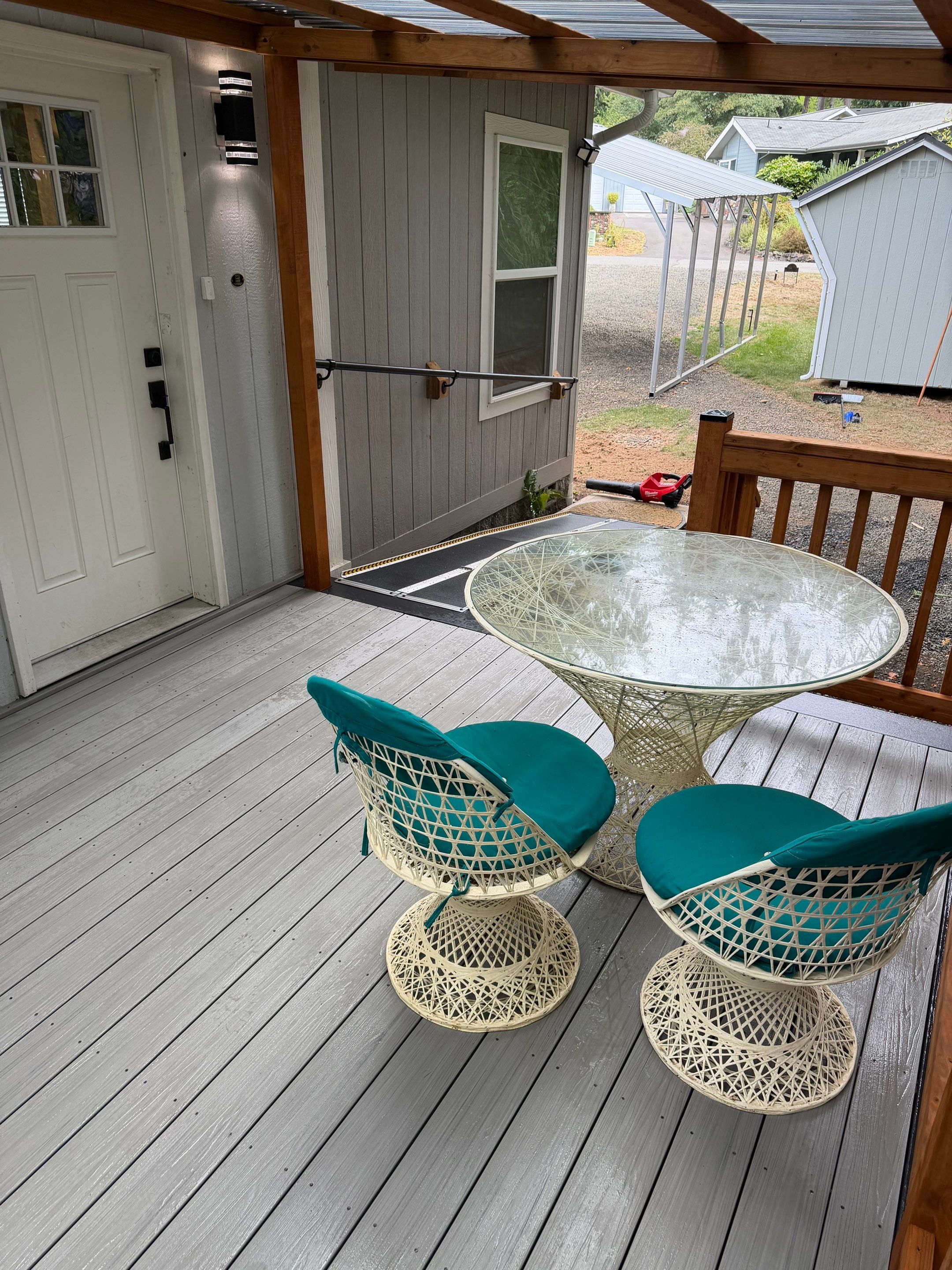 Covered Composite Deck with Translucent Pergola Roof in Port Orchard by Expedeck