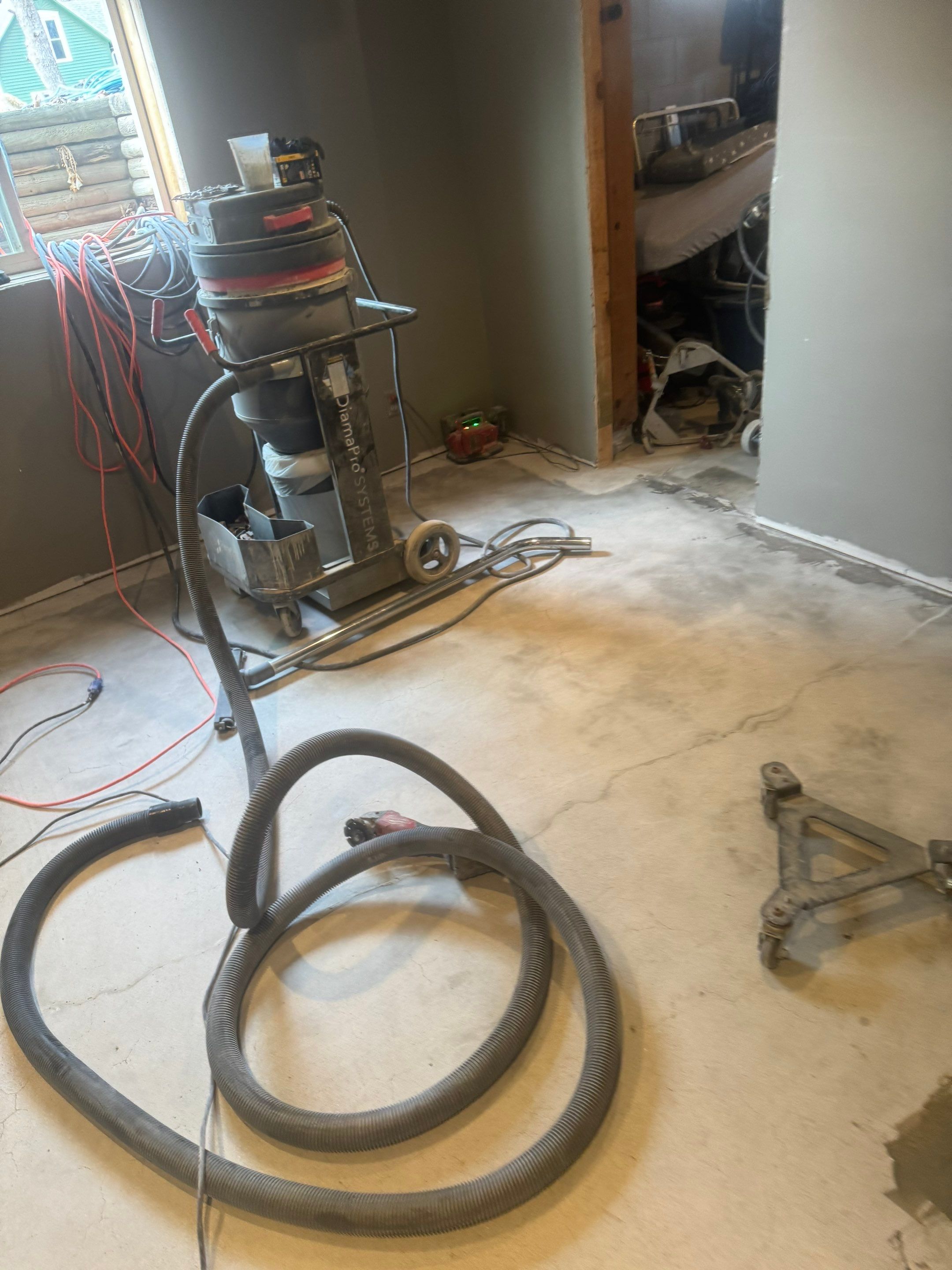 Custom Multi-Fleck Epoxy Floor Coating for Residential Basement by Select Painting, Coatings & Garage Cabinets