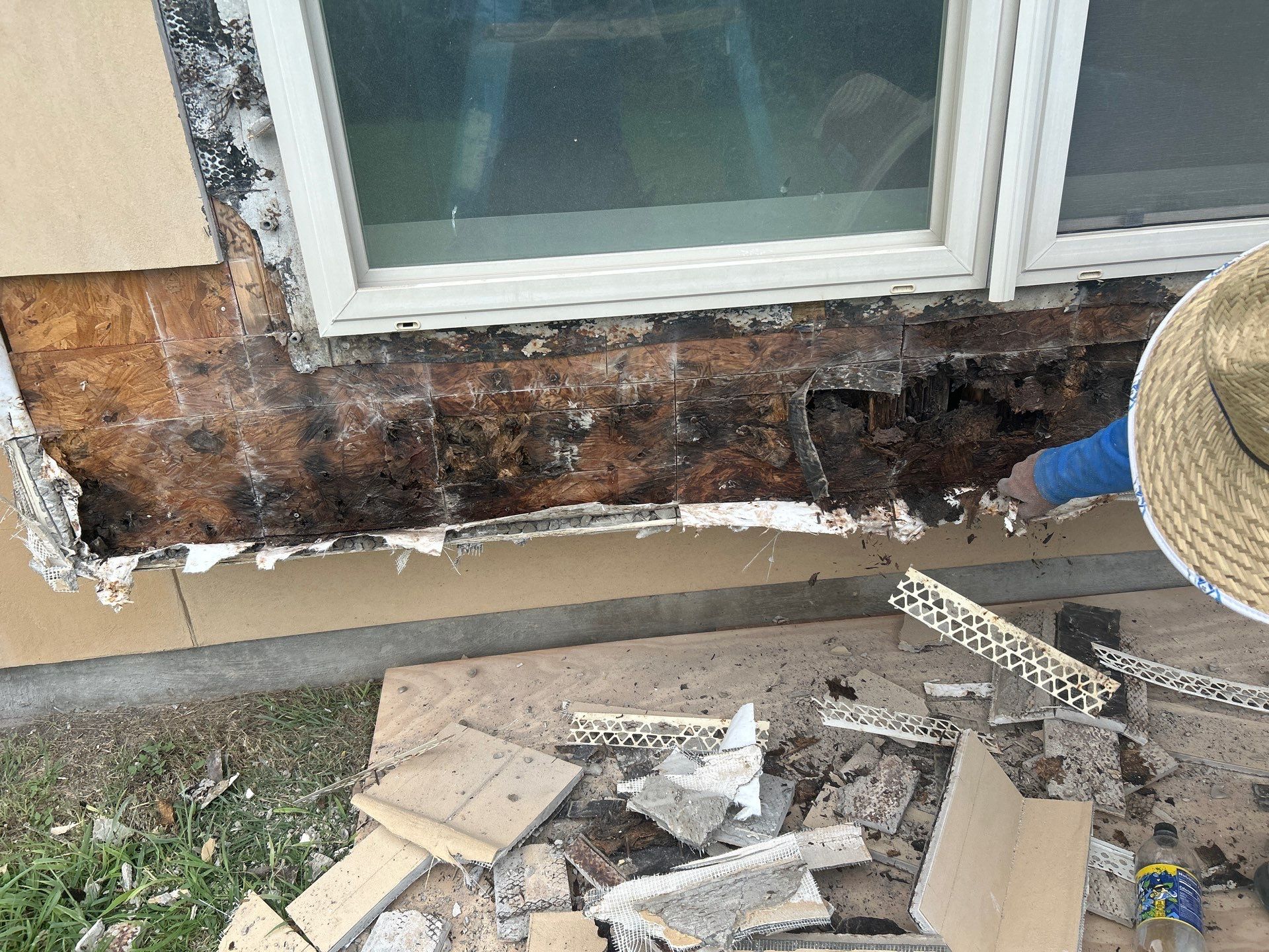 Installing Windows on a Submarine  by Bayfront Roofing and Construction