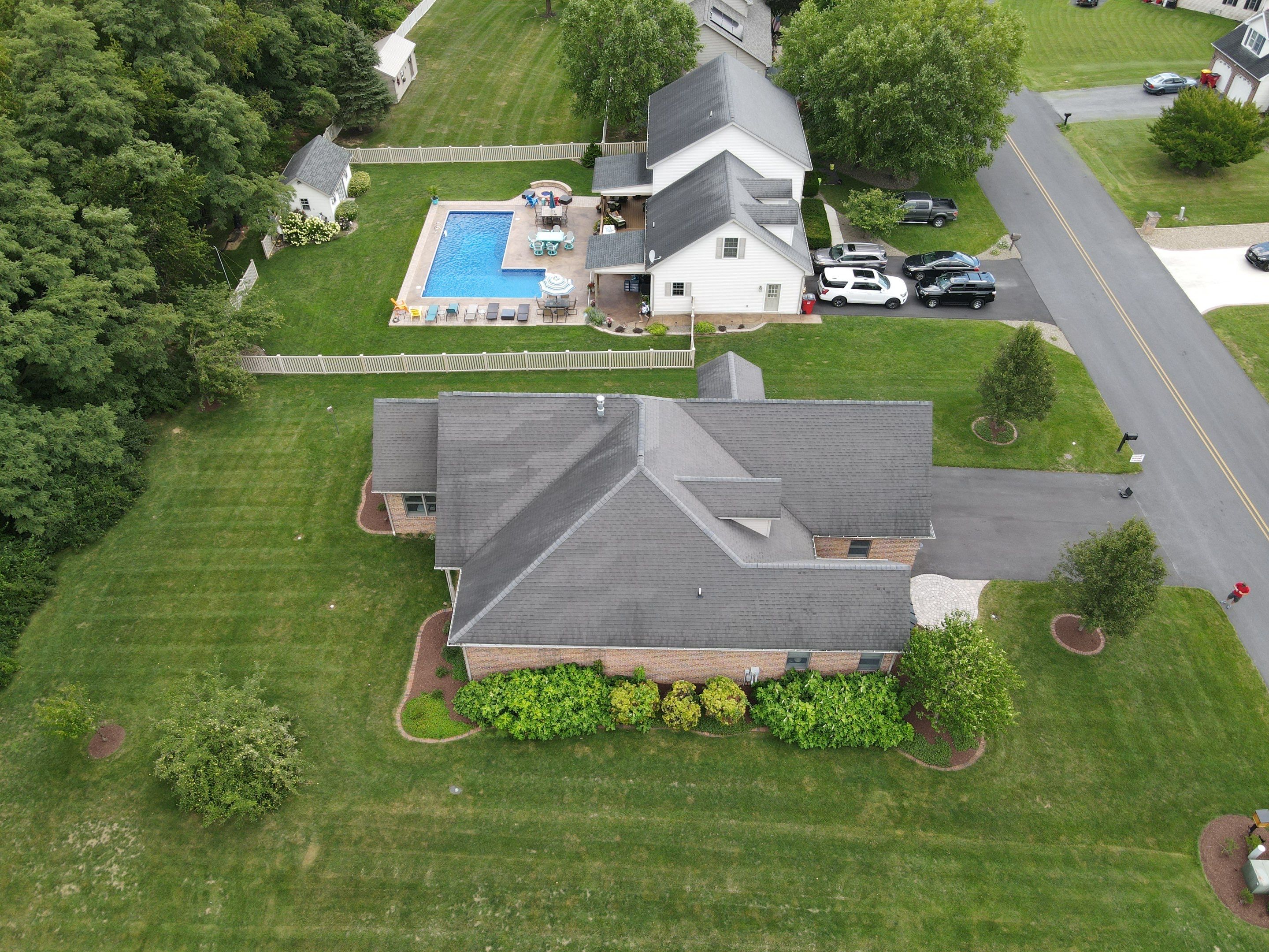 Standing seam / Azm panel in black  by Teflon Roofing