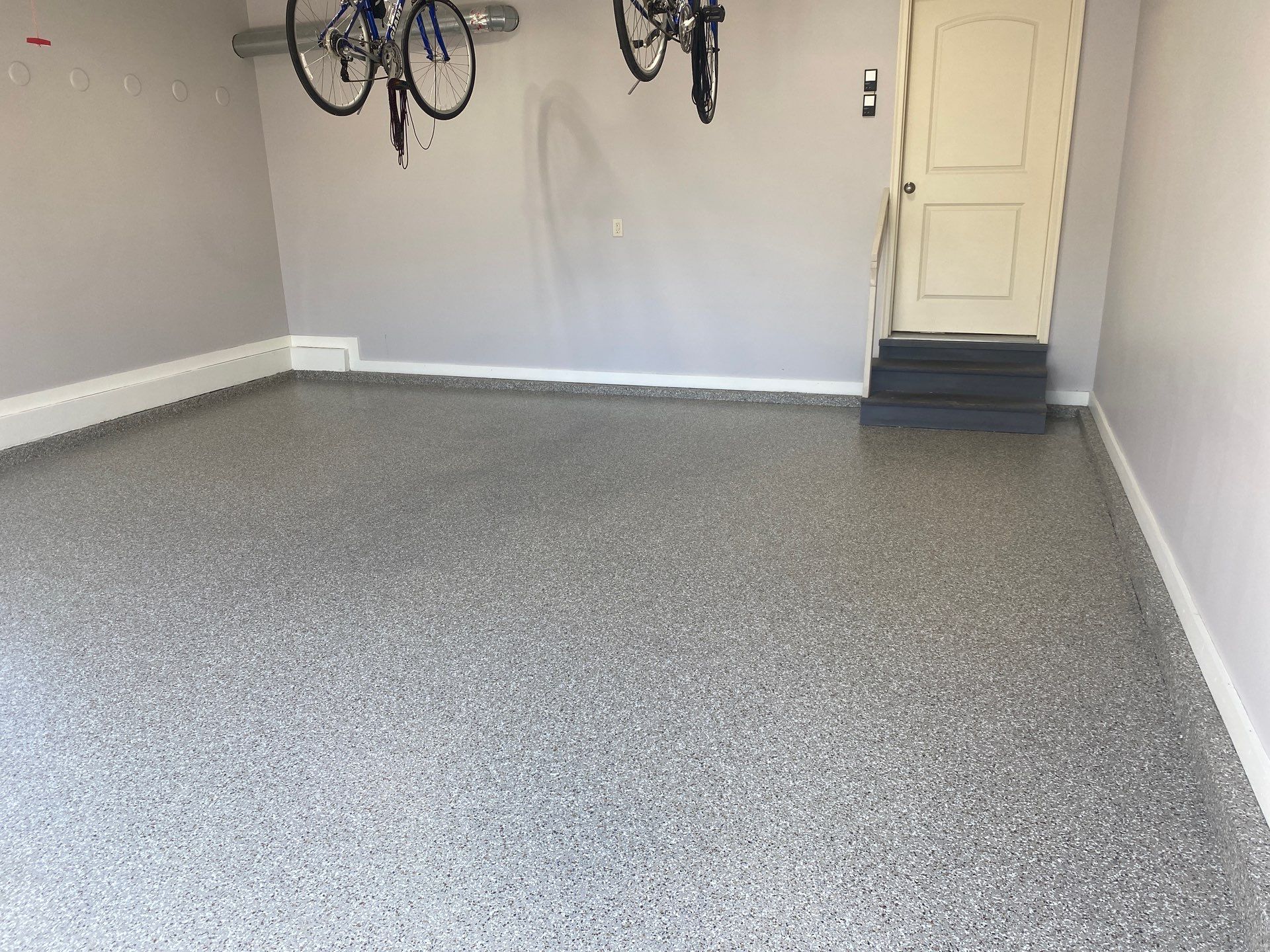 Dick E. gets a new garage floor! by Banner Garage