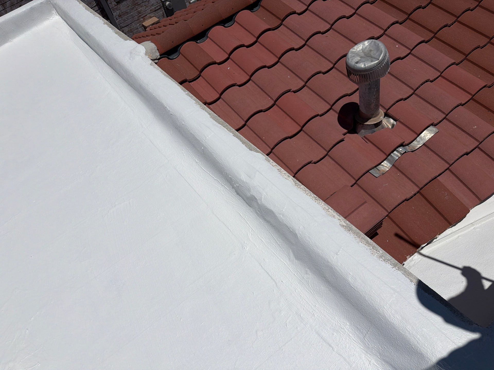 Tucson Residential Roof Restoration with Tile and Elastomeric Coating by West Coast Roofing AZ