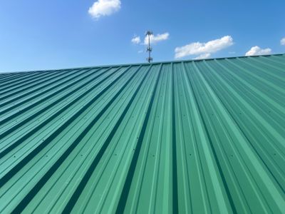 Commercial Roofing Repair using Ag panel green 