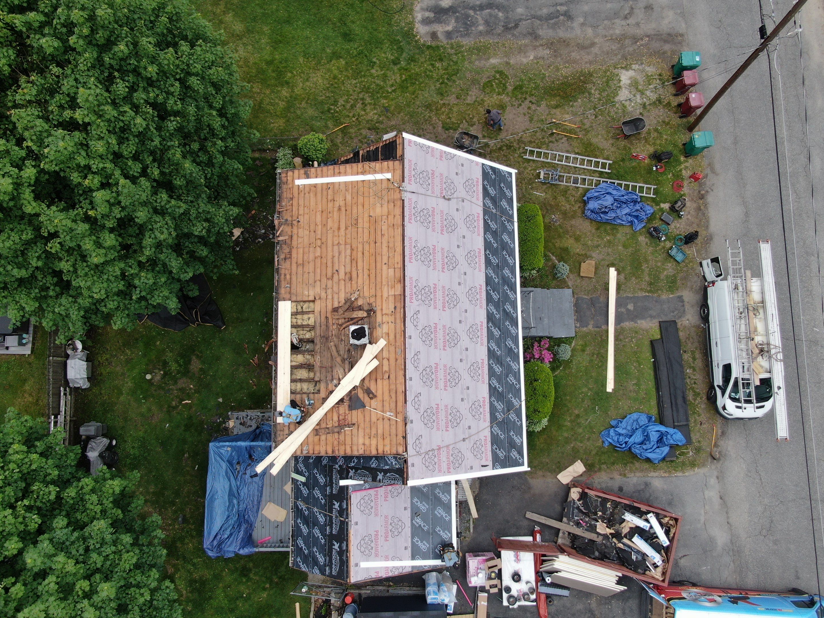 Roof and Flat Roof Membrane Replacement in Lowell, MA by Mighty Dog Roofing of Greater Middlesex County