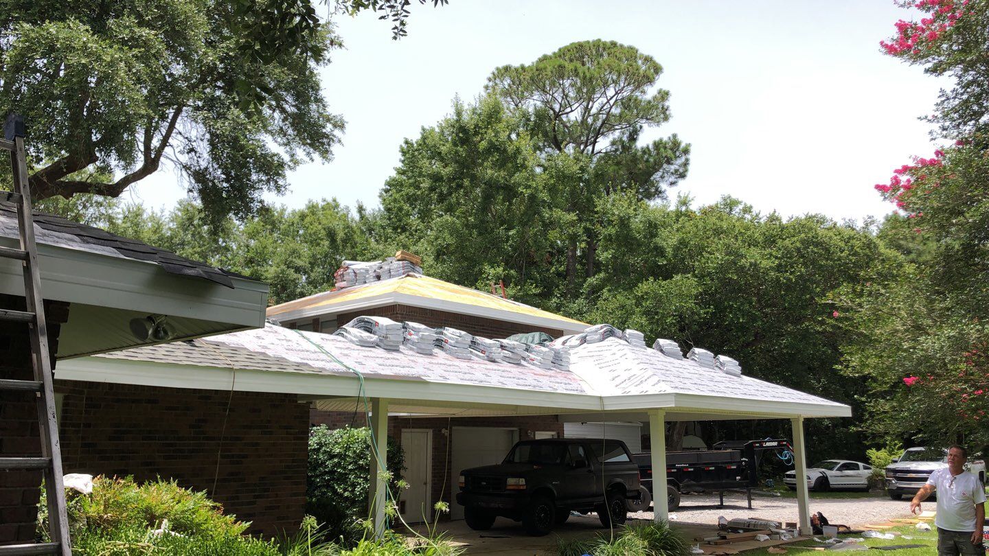 Residential Roofing Installation using Roof Replacement by American Roofing & Construction LLC