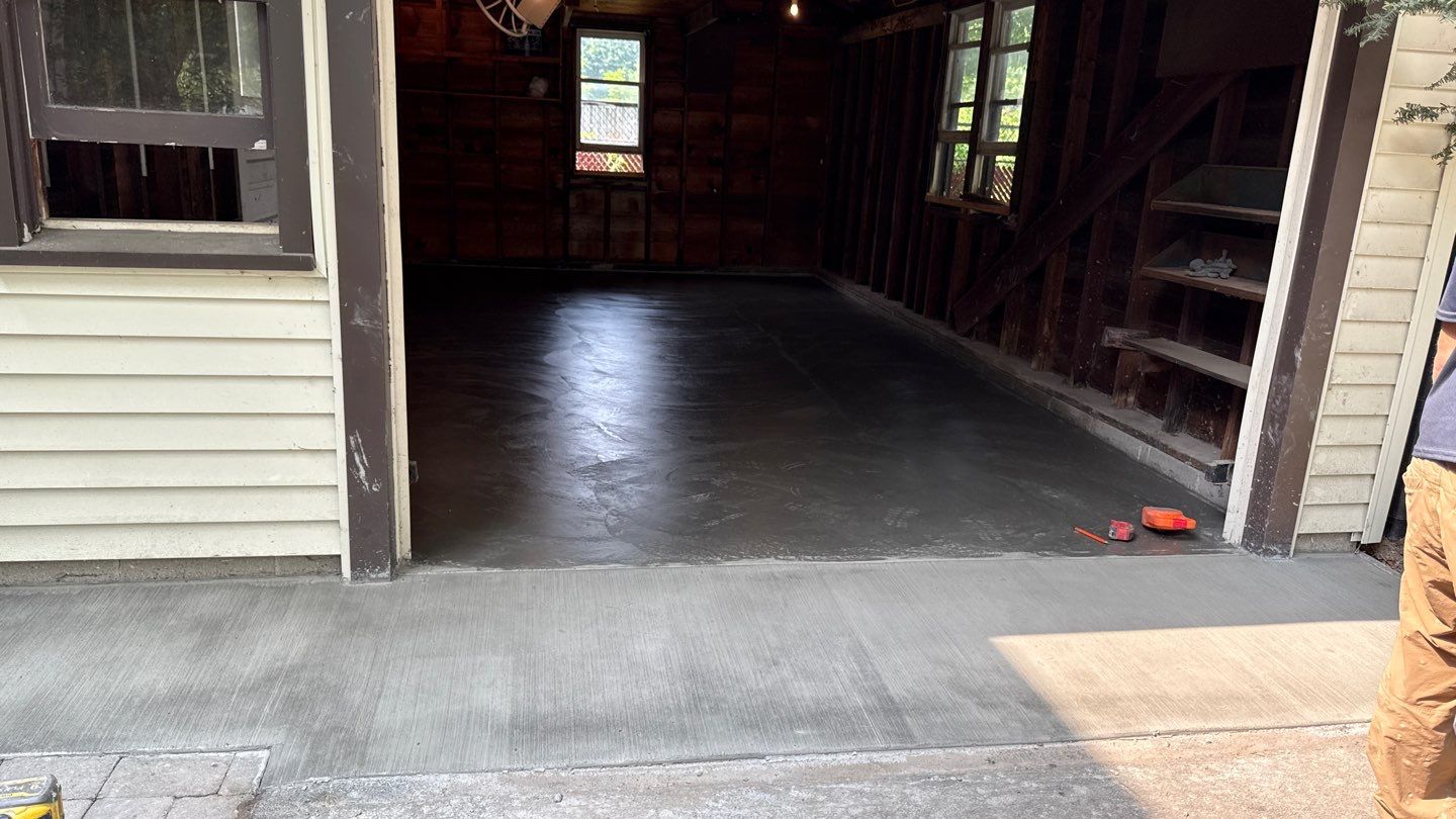 Concrete garage floor replacement by NG Masonry & Construction LLC