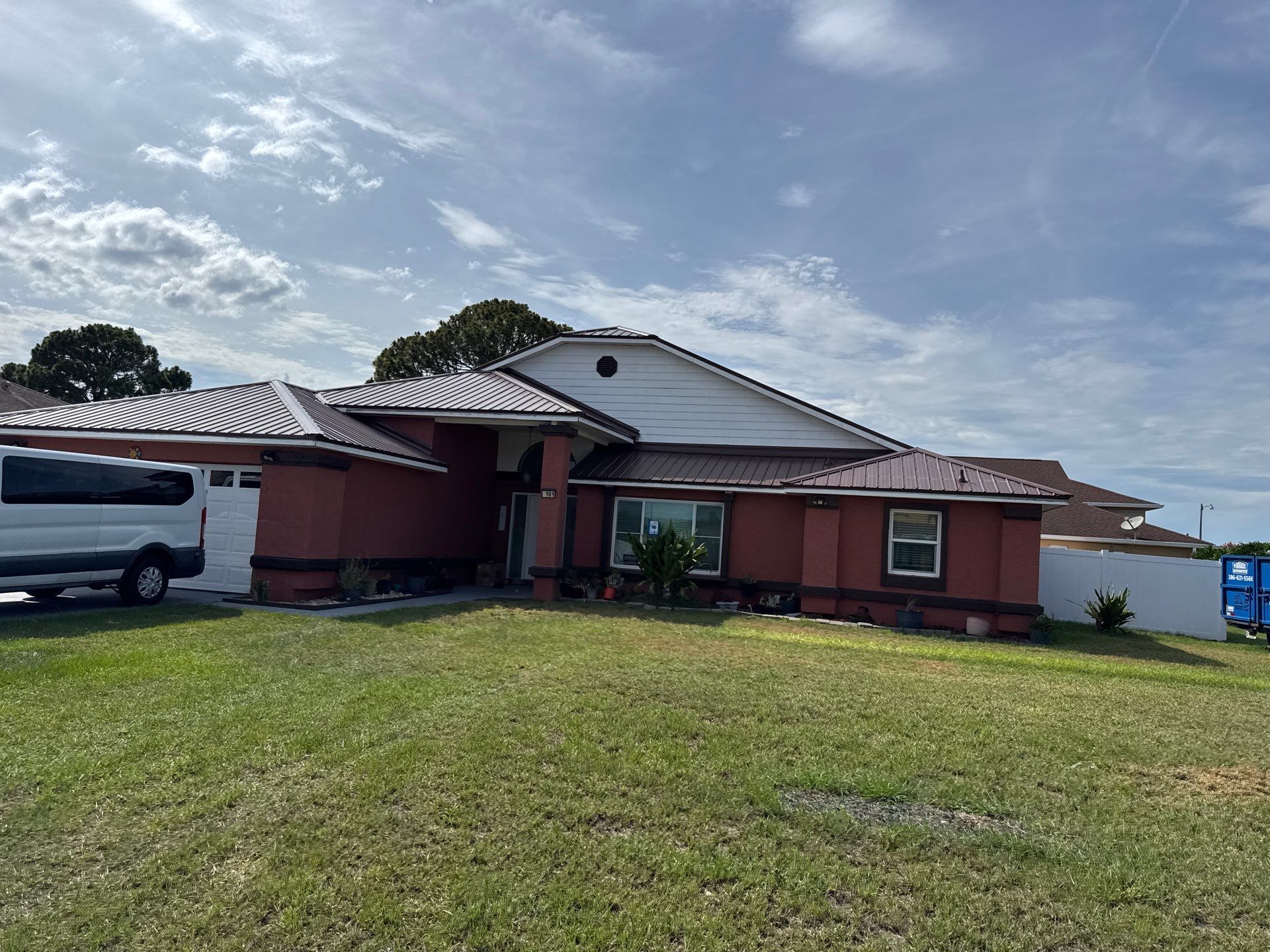 Residential Metal Roofing Installation and Gutter Replacement in Kissimmee by Pinnacle Roofing Group