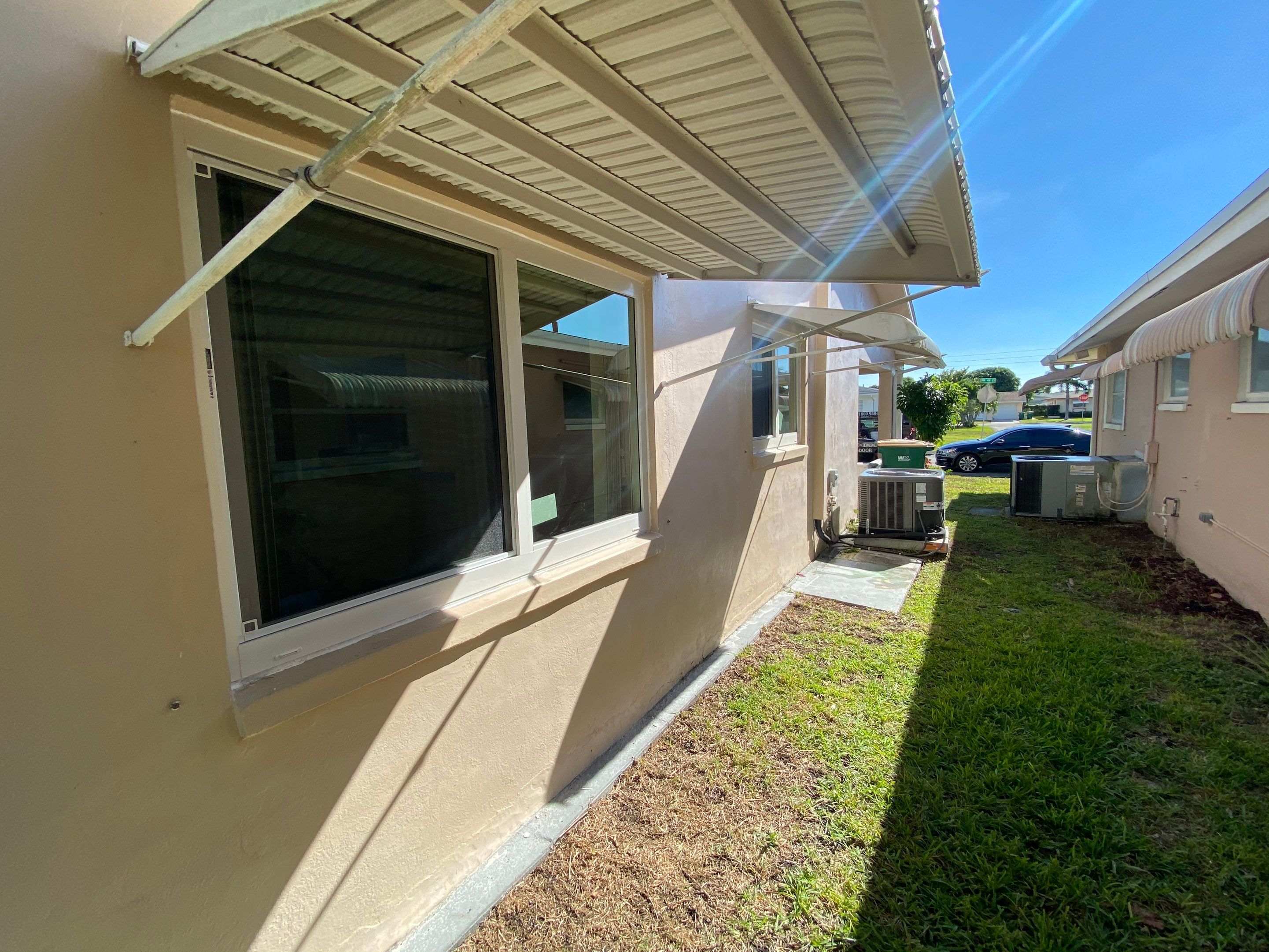 Tamarac Residential Entry Door and Aluminum Window Installation Project by The Door Doctor of South Florida, Inc.