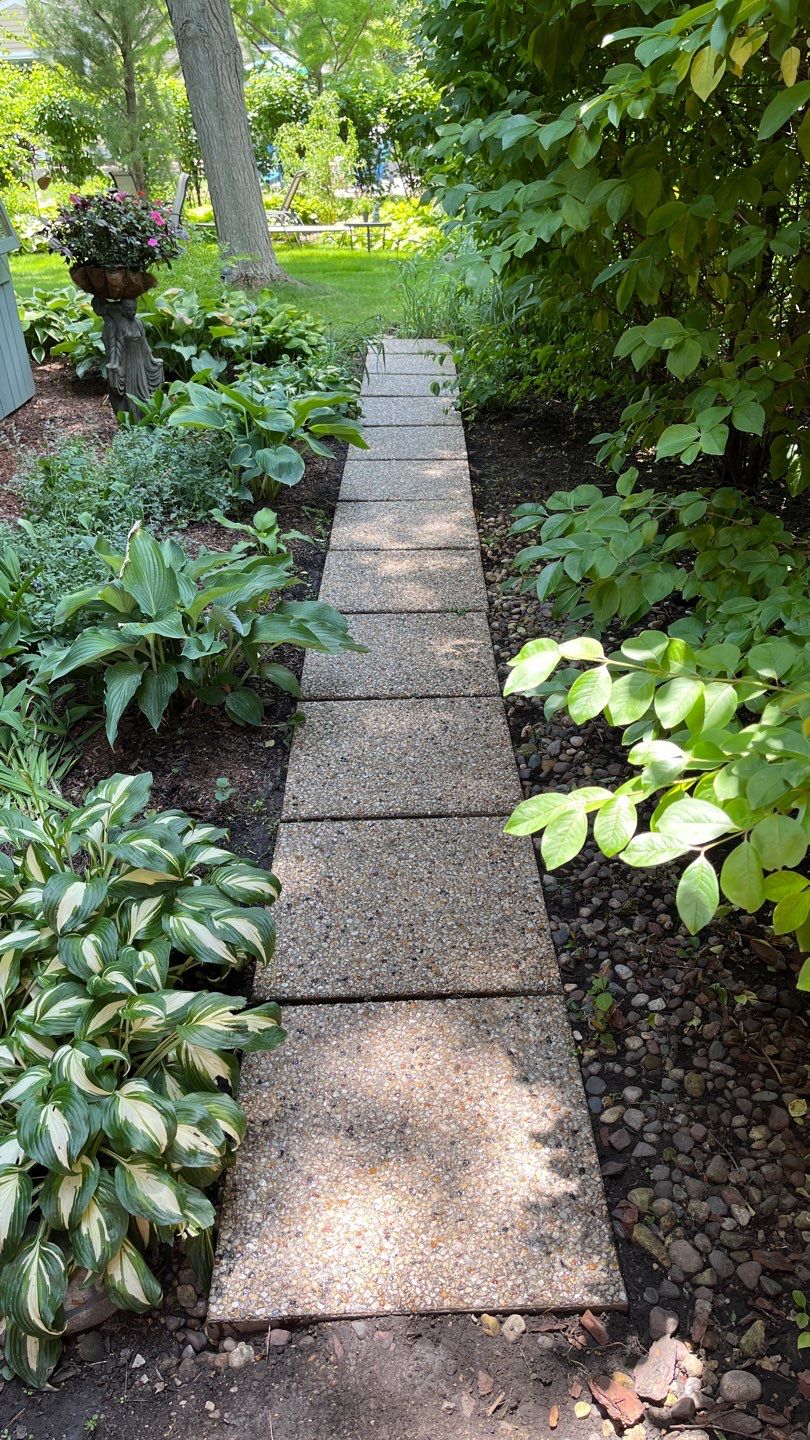 Aggregate concrete cleaning and sealing using Surebond SB-9000 by Northern Power Washing LLC.