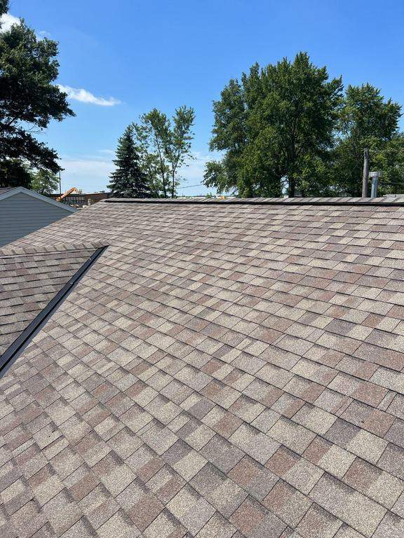 Residential Roofing Repair using Ridge vent replacement by Nitro Roofing and Construction