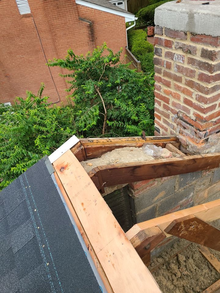 Springfield Tree Damage Restoration: CertainTeed Landmark Designer Shingles in Charcoal Black by RM Banning, Inc.