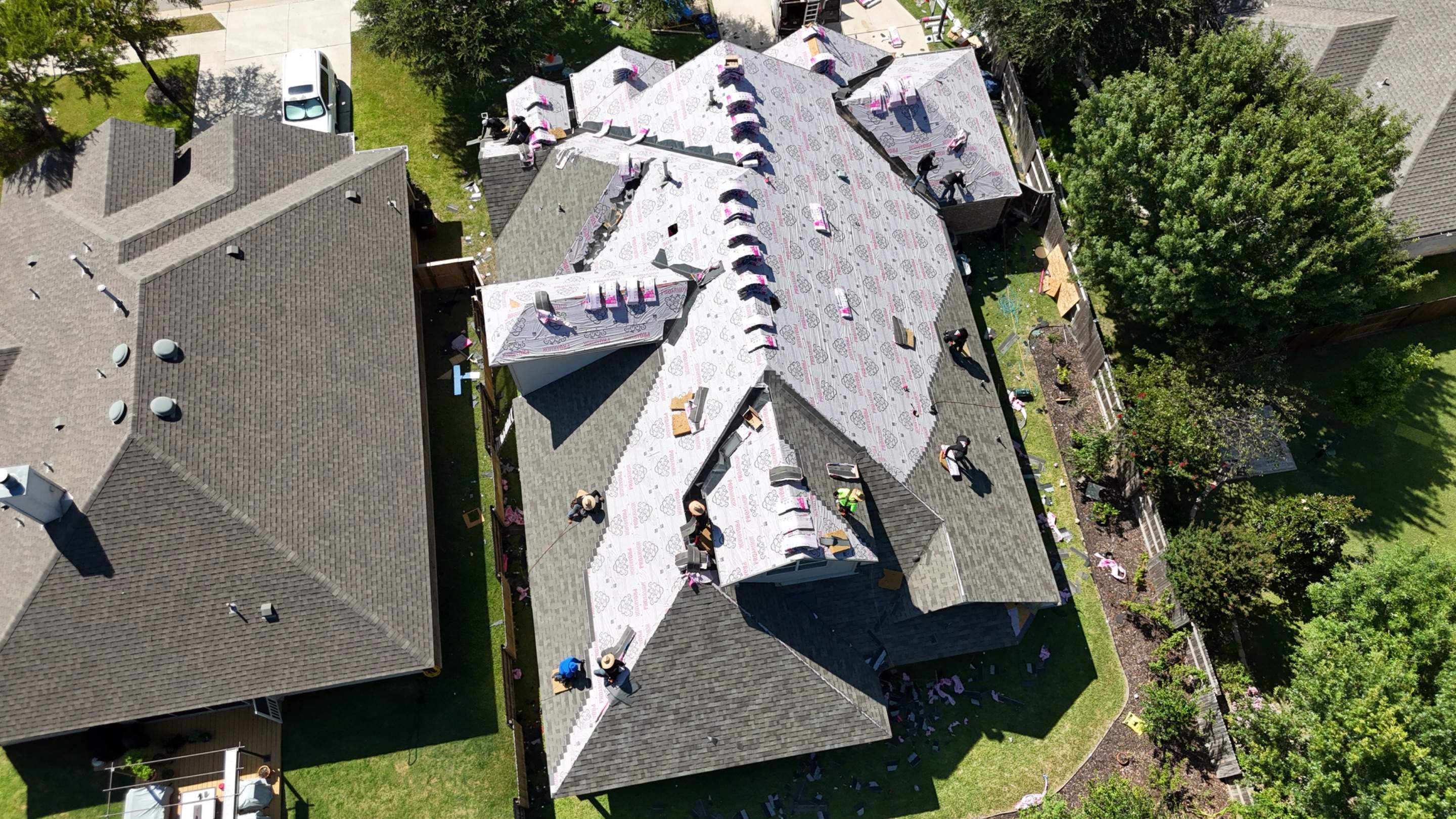 Residential Asphalt Shingle Roof Replacement and Solar Fan Installation by RoofsOnly.com