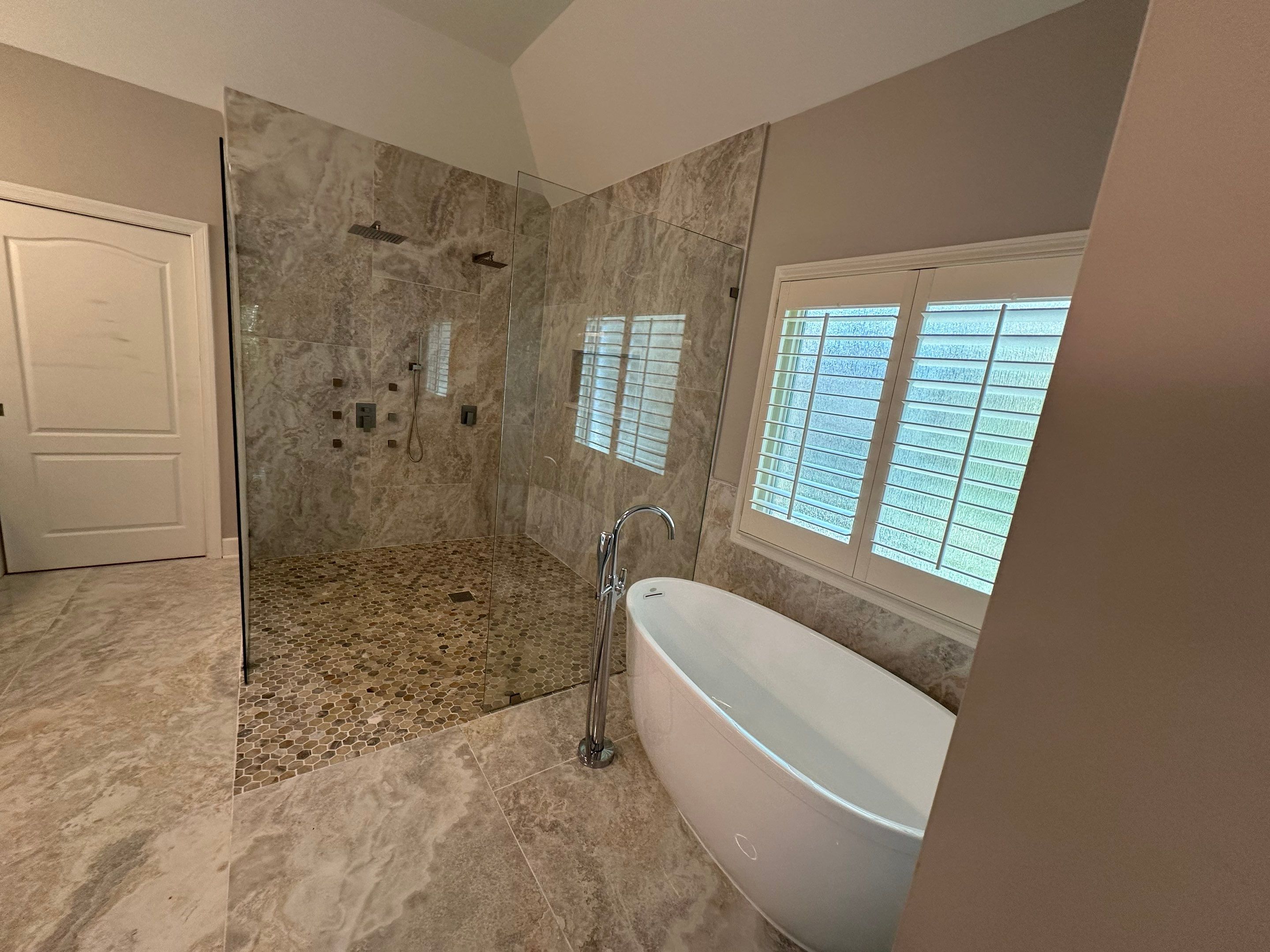 Finished Tiled Bathrooms by Next Step Contracting