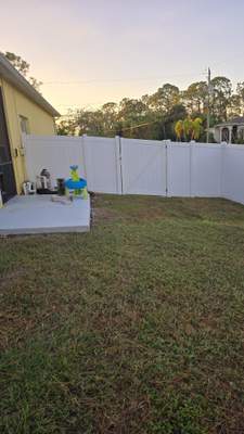 White Vinyl Privacy Fence Repair and Gate Installation in North Port