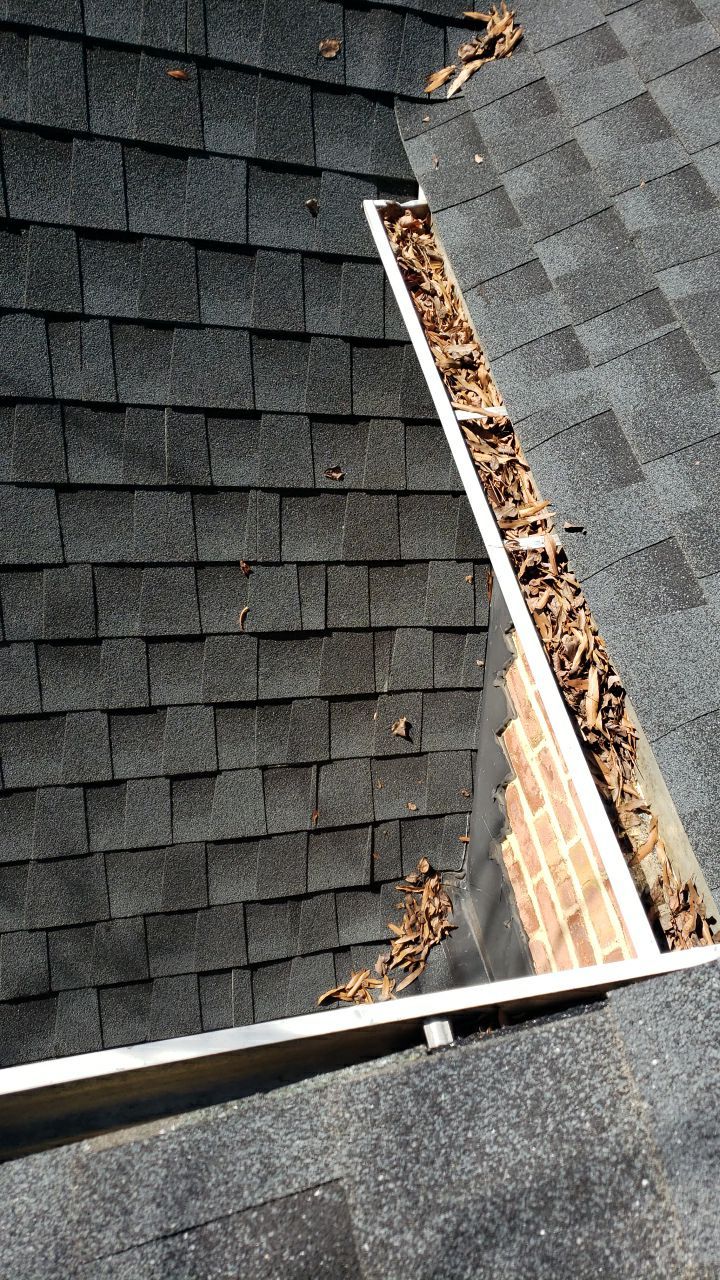Gutter Cleaning using water by Power Wash Masters LLC