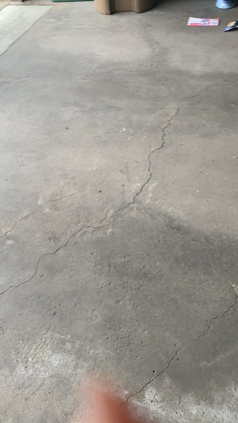 West Des Moines Garage and Patio Floor Coating using Pebble Beach Flakes by Revival Concrete Coatings