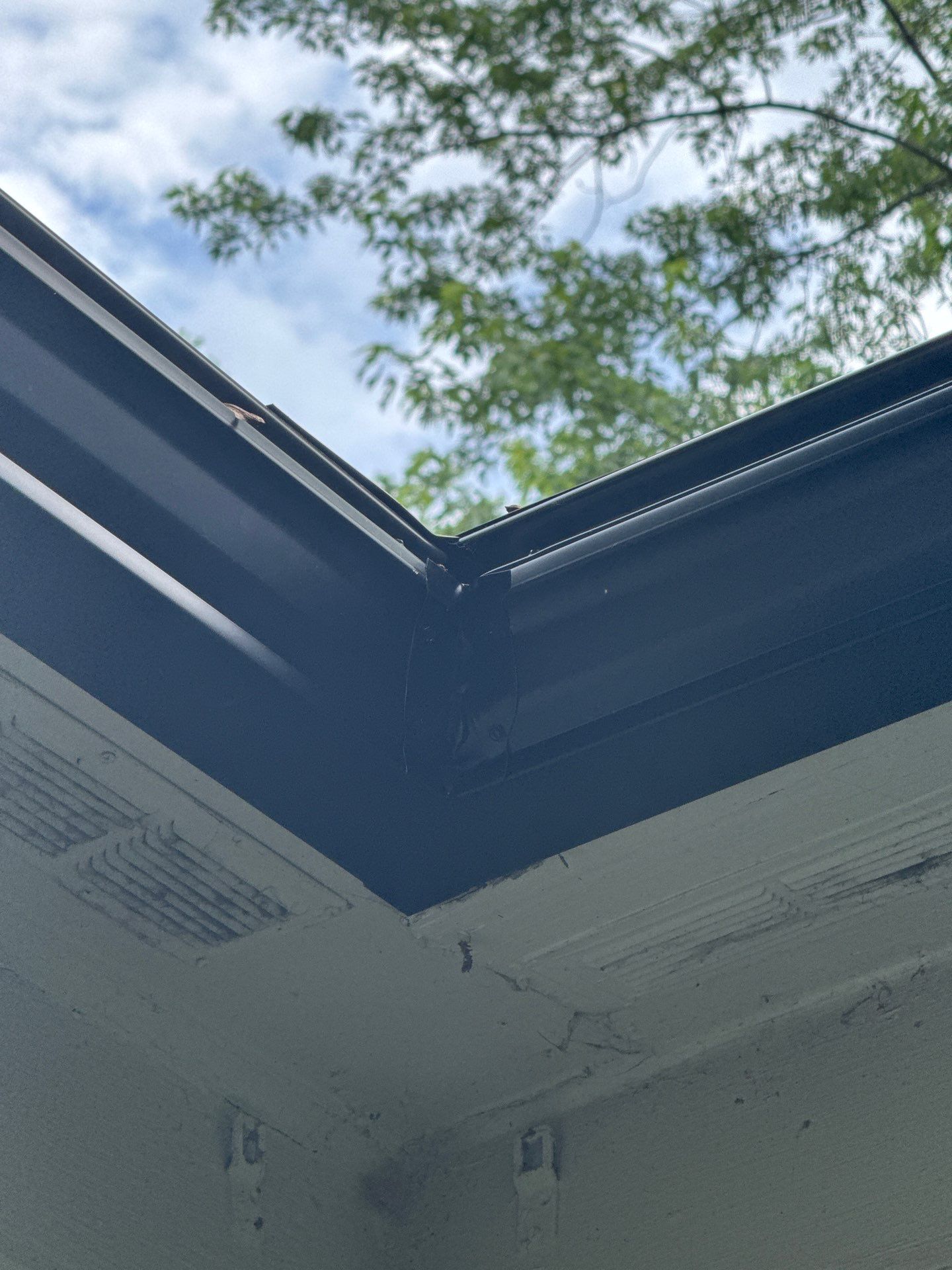 Eagan - Black Seamless Gutters with Helmet Style Guards by Forever Fortified
