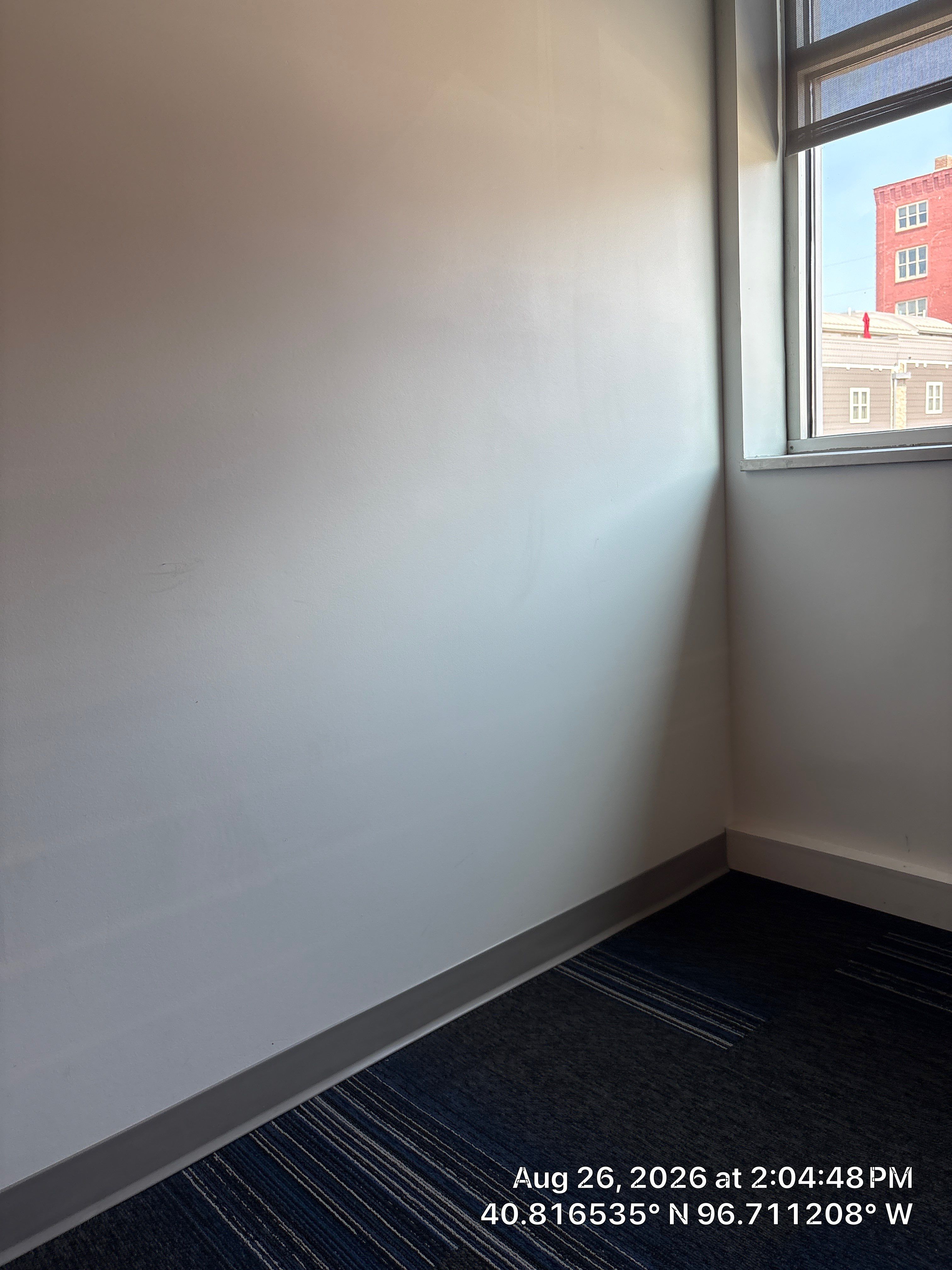Modern Lincoln Office Setup with Integrated Indoor Putting Area by CompanyCam Sales Demo