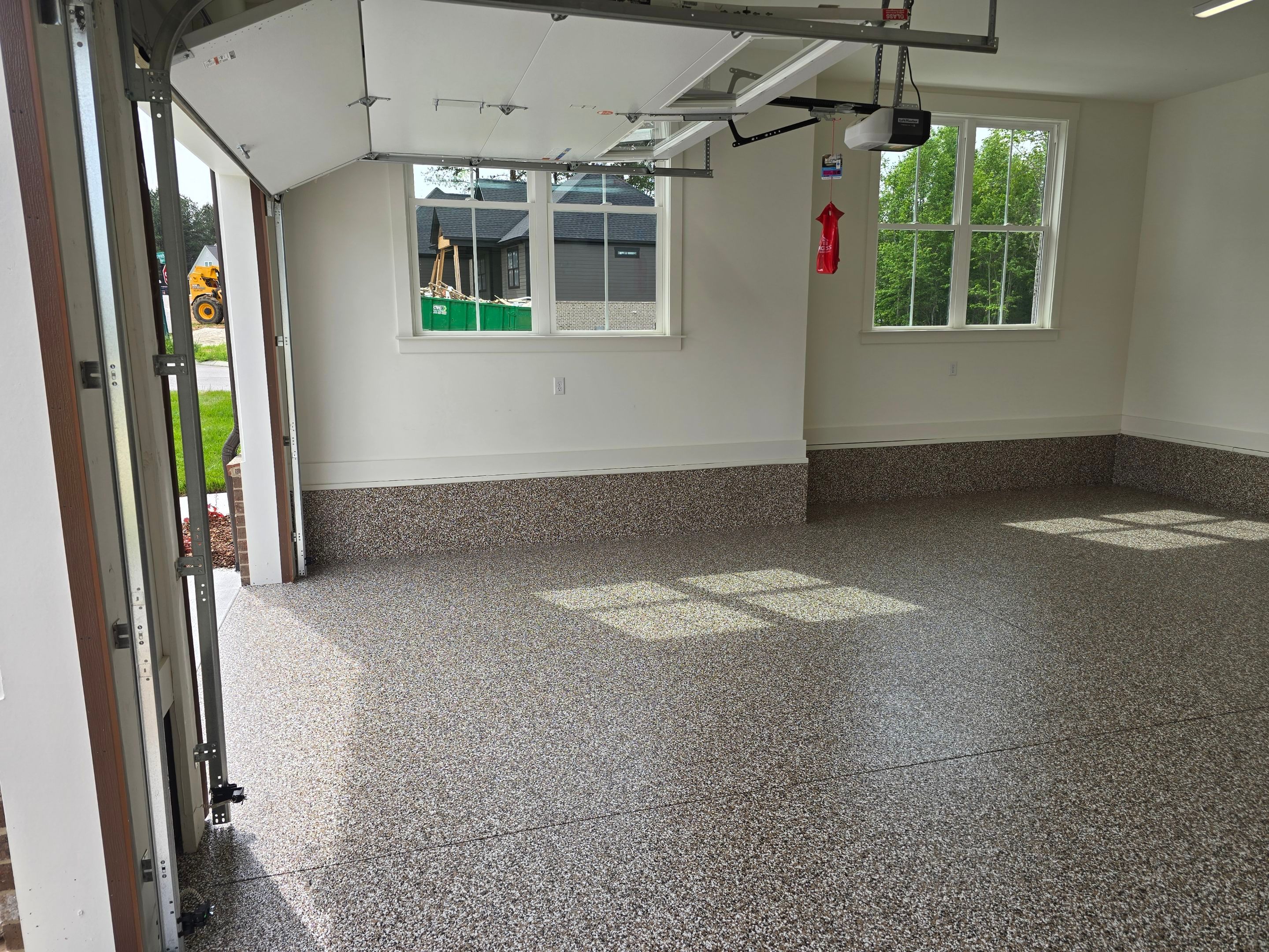 Garage & Porch Upgrade Using Mocha Match & Obsidian  by Elite Floor Solutions