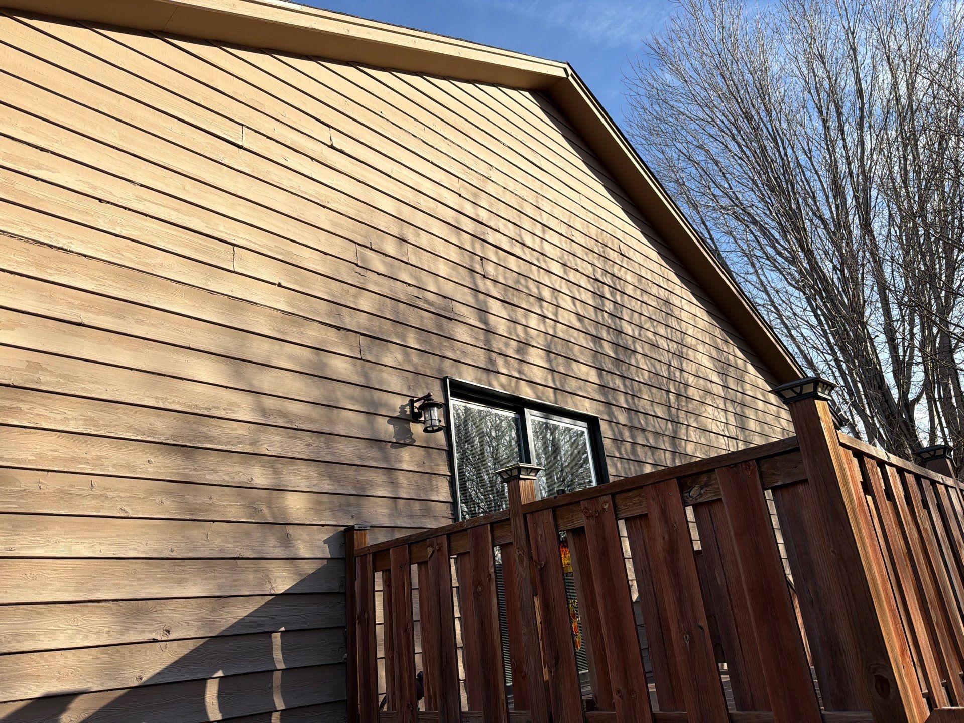 Wood Siding Restoration and Exterior Painting in Sioux Falls by Select Painting, Coatings & Garage Cabinets