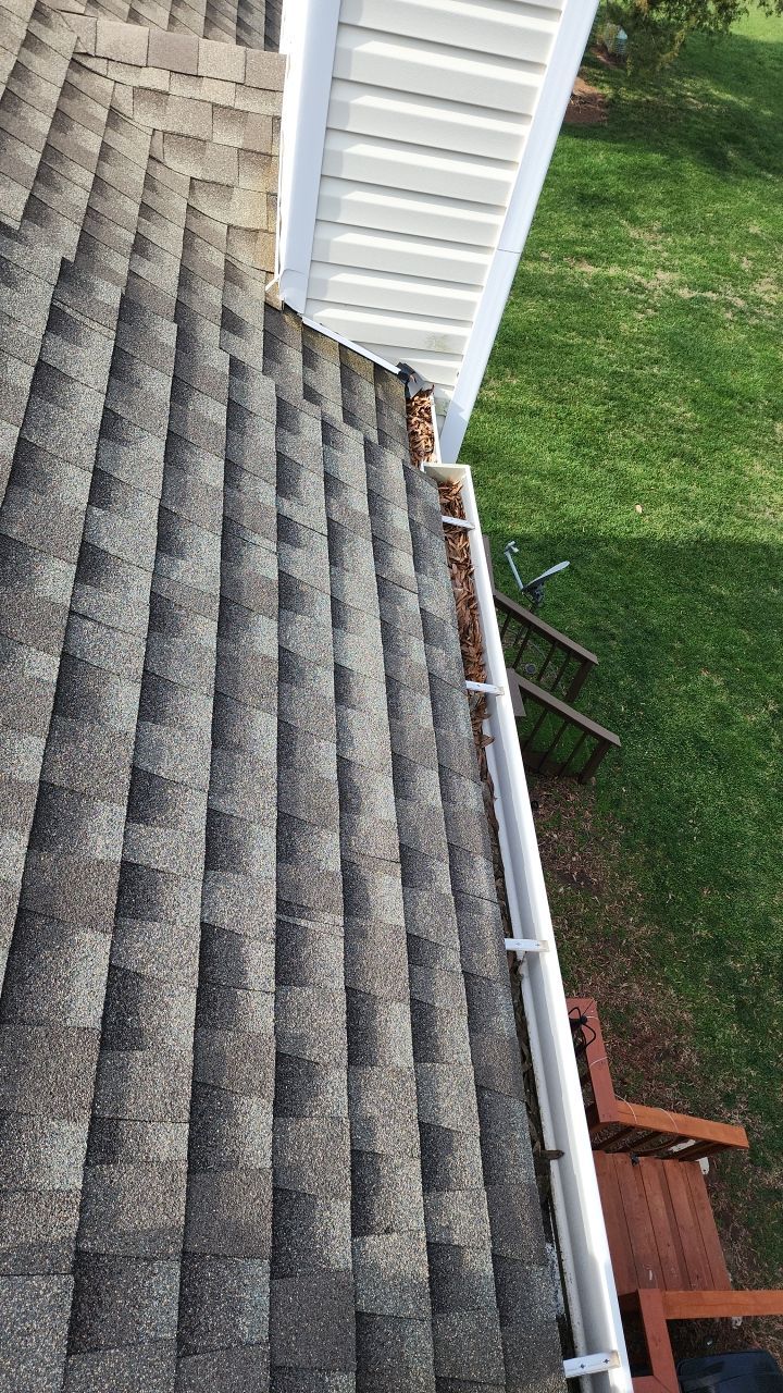 Gutter Cleaning using water by Power Wash Masters LLC