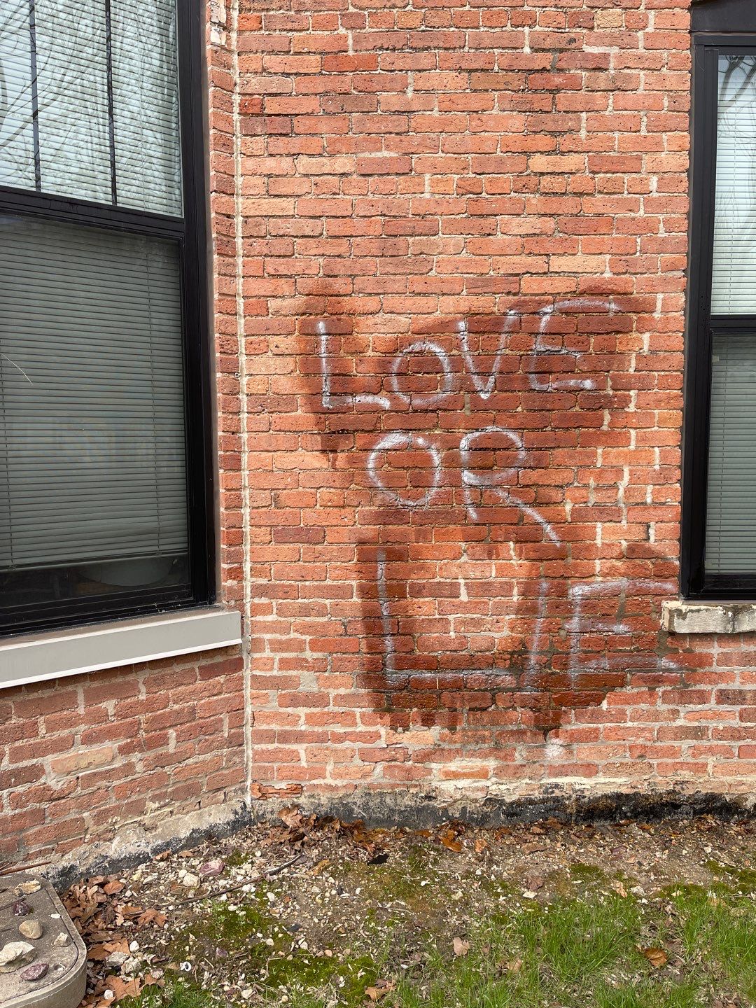 Graffiti removal  using Graffiti remover by Northern Power Washing LLC.