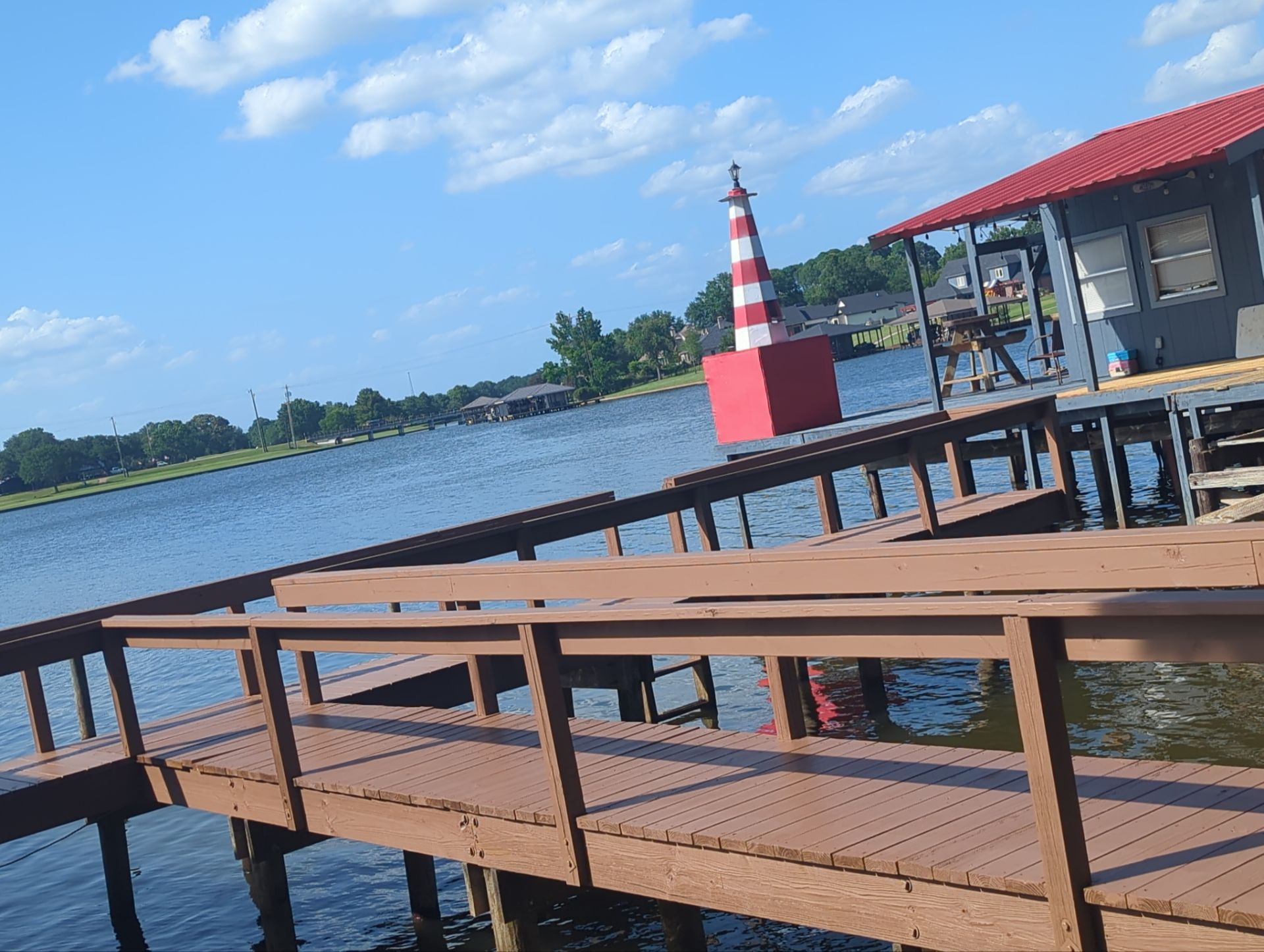 Lake House Deck Restaining in Flint, Texas by Quality Coats Painting