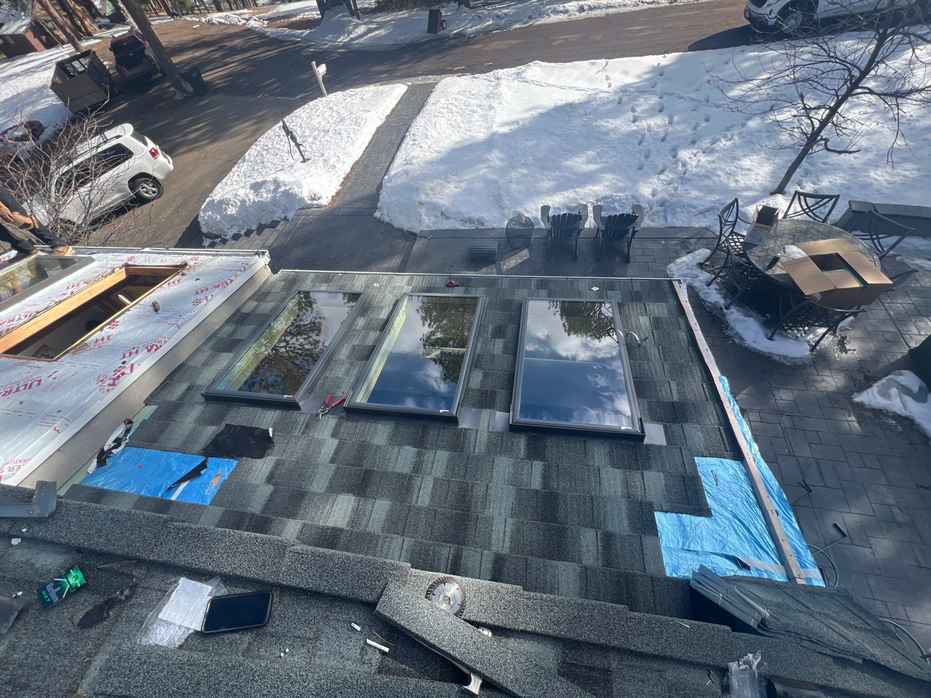 Residential Roofing Installation using Stone Coated Steel by Blue Peaks Roofing LLC 