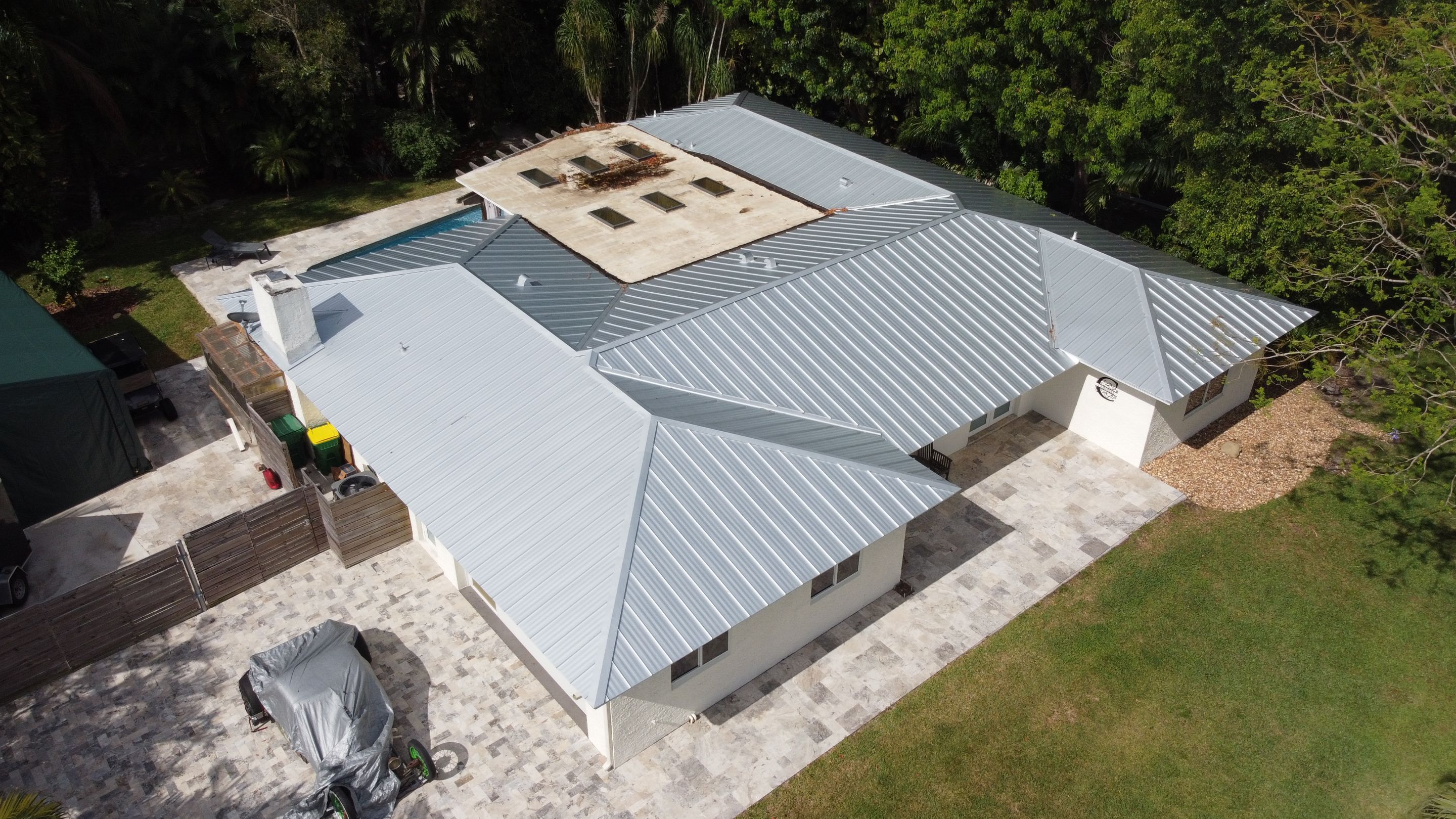 Residential Roofing Installation using 1" Nail strip metal roof by BLUES BROTHERS ROOFING