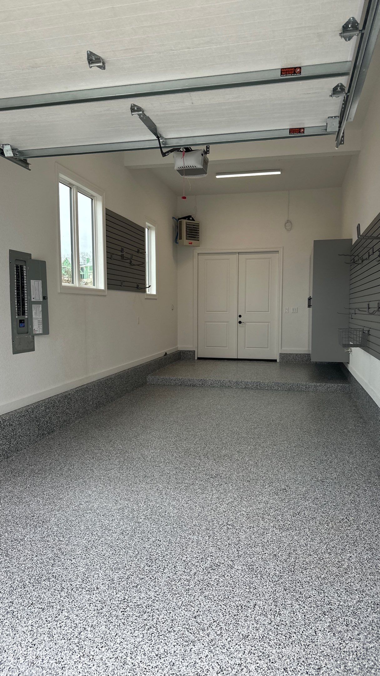 Mike & Pam transformed their garage with a Banner Garage Floor and Cabinets by Banner Garage