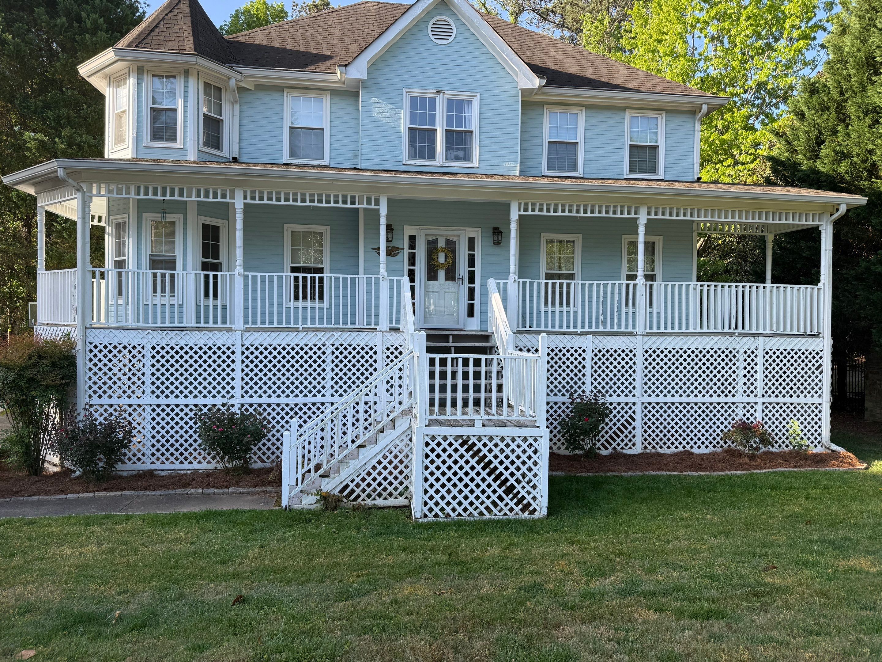 Marietta Porch Upgrade with Horizontal Pressure-Treated Wood Slats by Swift Home Renovations