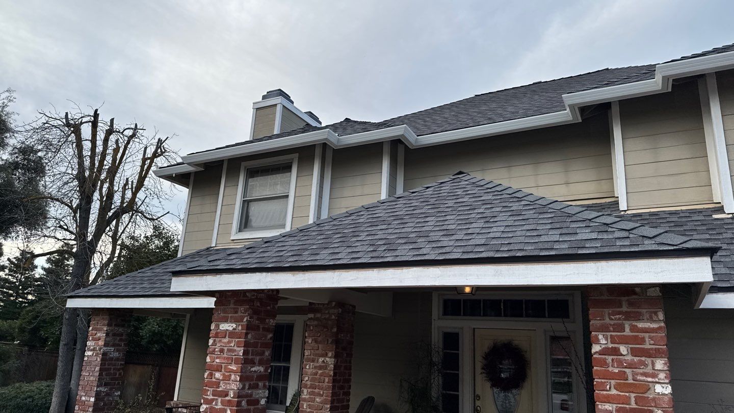 New shingles and gutters using GAF Timberline HDZ shingles and aluminum gutter by Straight Edge Roofing Inc